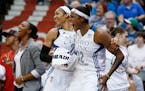 Lynx forward Rebekkah Brunson (32) celebrated with forward Maya Moore the closing minutes of the 94-70 victory over Seattle on June 11 at Target Cente