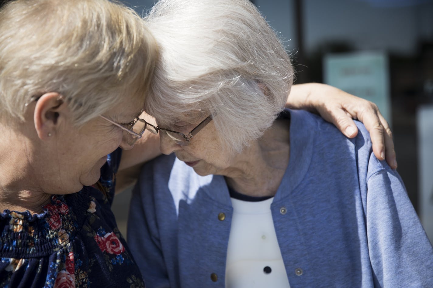 Eileen Adams, left, embraced Betty Agee after taking her to get a haircut right after she checked out of an assisted living facility she had been living in after an injury on June 27, 2017, in Minneapolis, Minn. Adams planned bring Agee home to live with her for constant supervision.