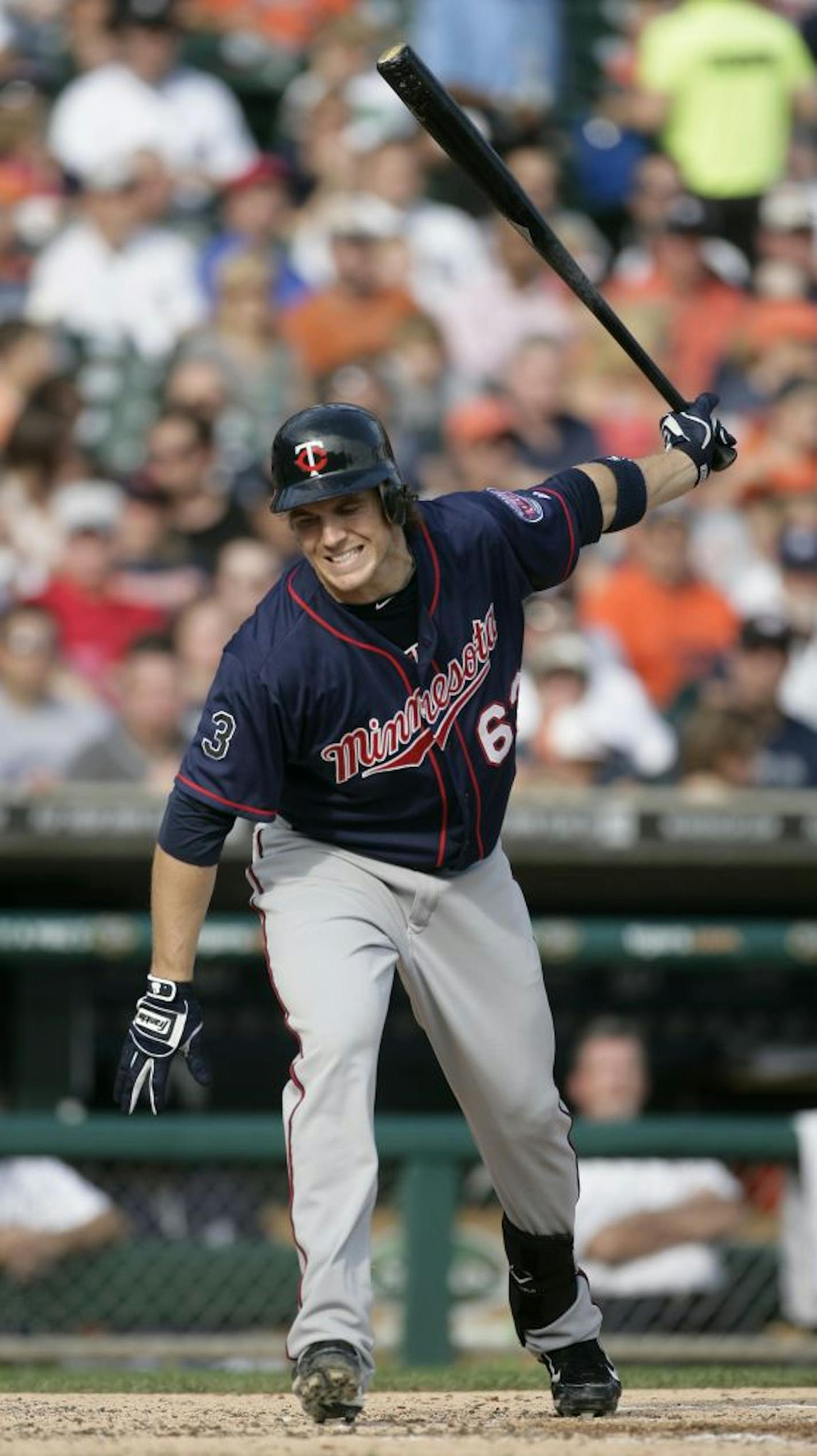 Minnesota Twins' Joe Benson reacts after striking out swinging against Detroit Tigers' Max Scherzer in the fourth inning of a baseball game, Saturday, Sept. 10, 2011, in Detroit. The Tigers defeated the Twins 3-2.