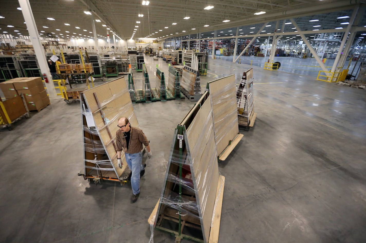 The space created by Renewal by Andersen's 2016 expansion is now cramped, and the company broke ground Monday on a new warehouse/office facility nearby. (Jerry Holt/Jerry.Holt@Startribune.com)