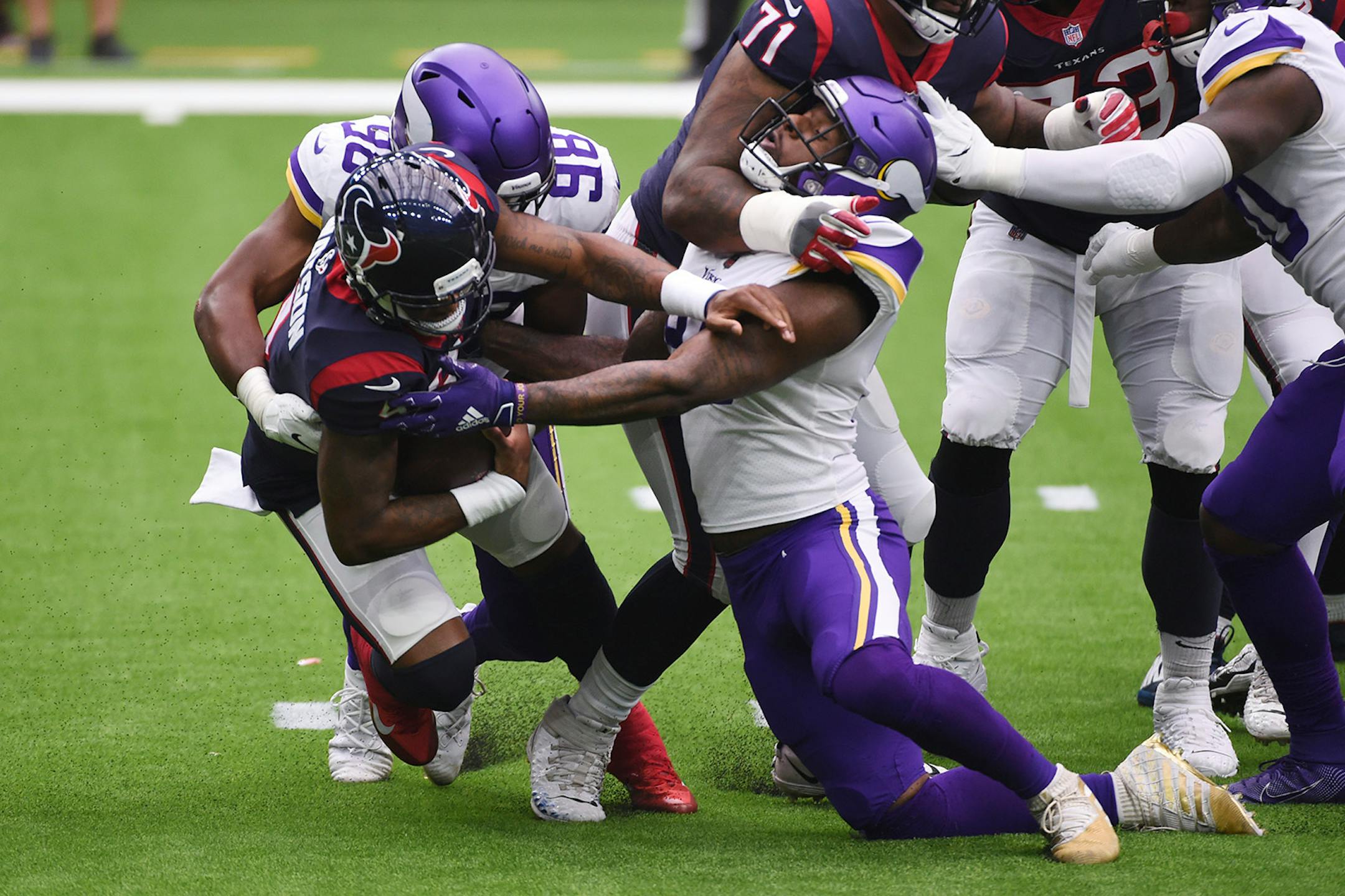 Houston Texans quarterback Deshaun Watson (4) is sacked by Minnesota Vikings defensive end D.J. Wonnum (98) during the first half of an NFL football game Sunday, Oct. 4, 2020, in Houston. (AP Photo/Eric Christian Smith)