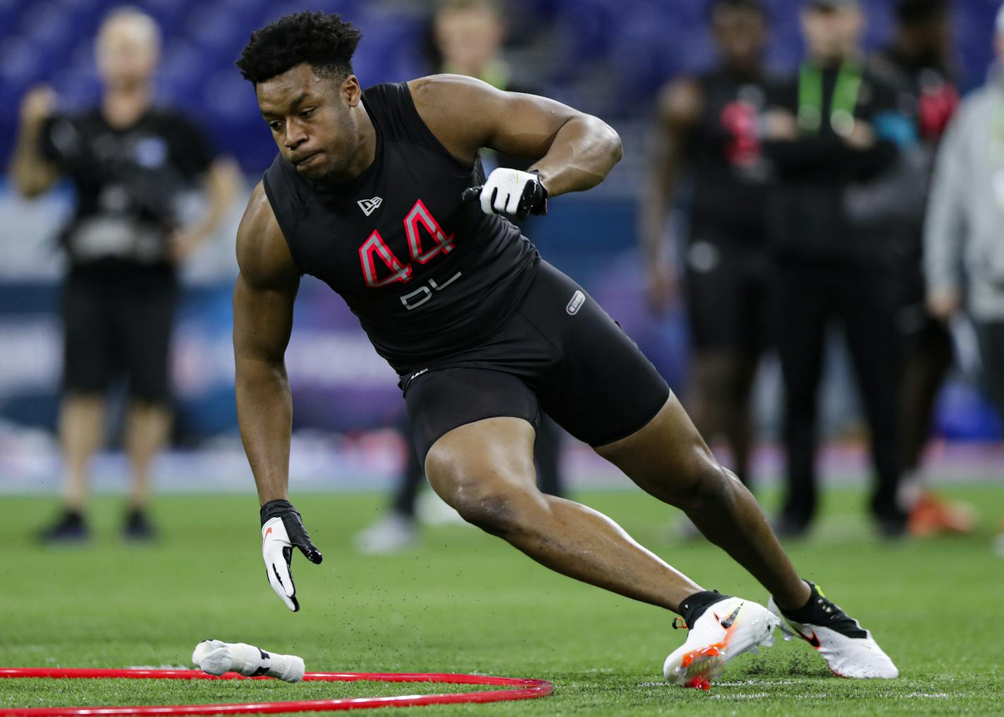 FILE - In this Feb. 29, 2020, file photo, South Carolina defensive lineman D J Wonnum runs a drill at the NFL football scouting combine in Indianapolis. The Minnesota Vikings selected Wonnum in the fourth round of the NFL football draft on Saturday, April 25, 2020. (AP Photo/Michael Conroy, File)