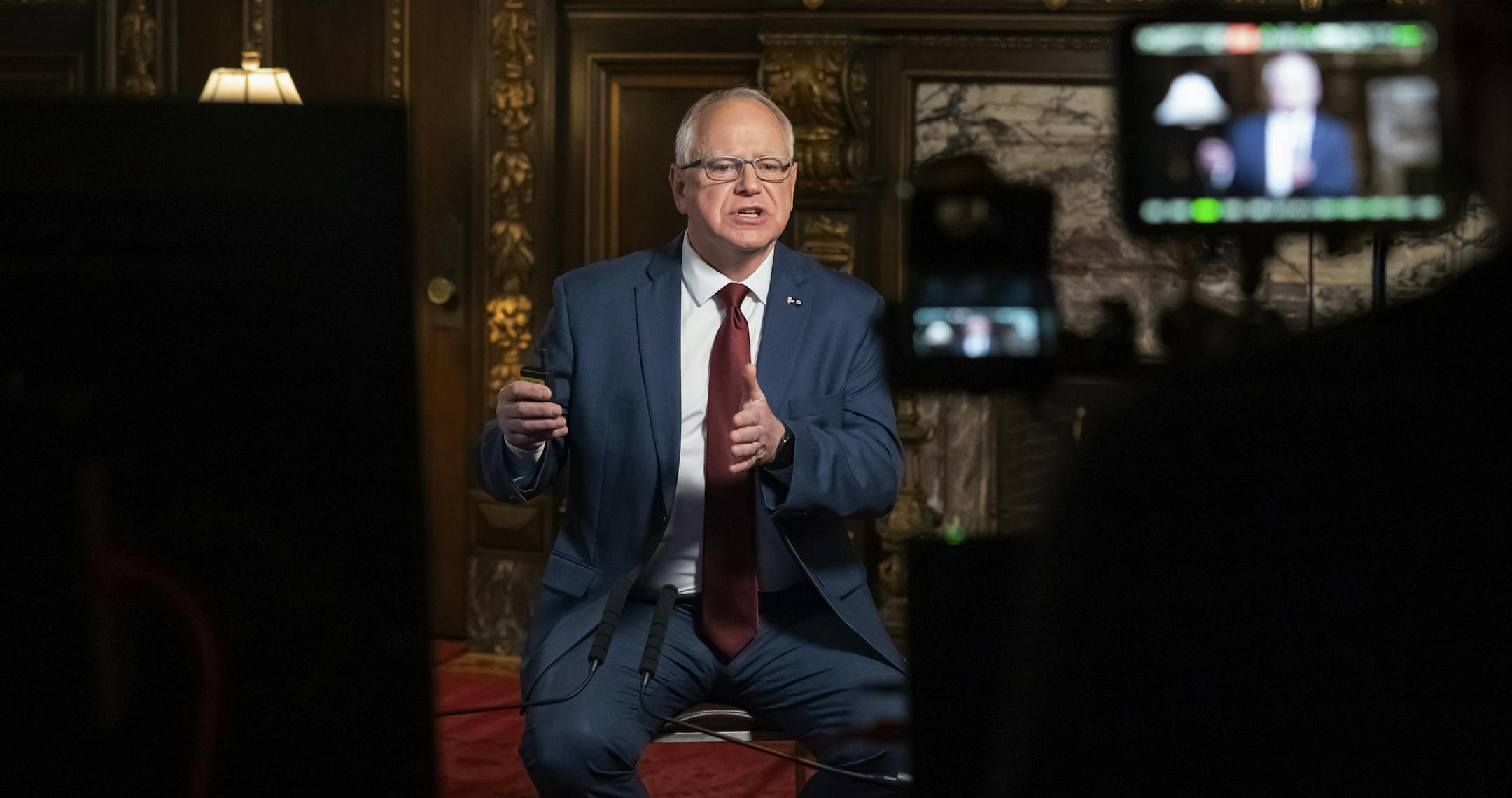 Minnesota Gov. Tim Walz speaks from the Governor's Reception room at the State Capitol, to discuss the latest steps in his response to COVID-19, Wednesday, Nov. 18, 2020, in St. Paul, Minn. (Glen Stubbe/Star Tribune via AP, Pool)