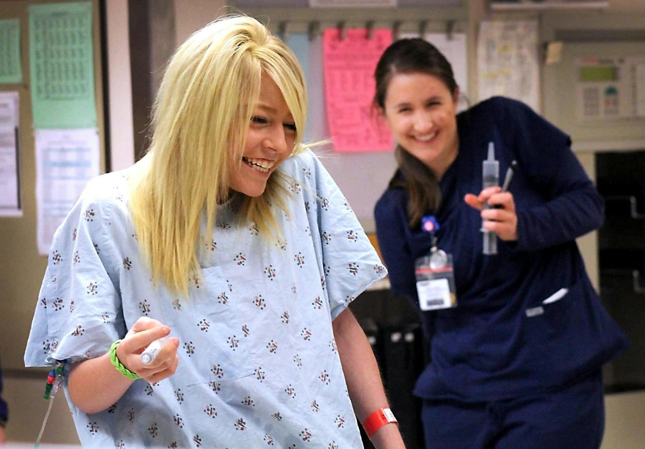 Sandeen got into a playful water fight with one of her nurses at St. Marys. Fifteen years ago, Sandeen was in a Rochester hospital for her first heart transplant. Now it’s time for a second new heart.