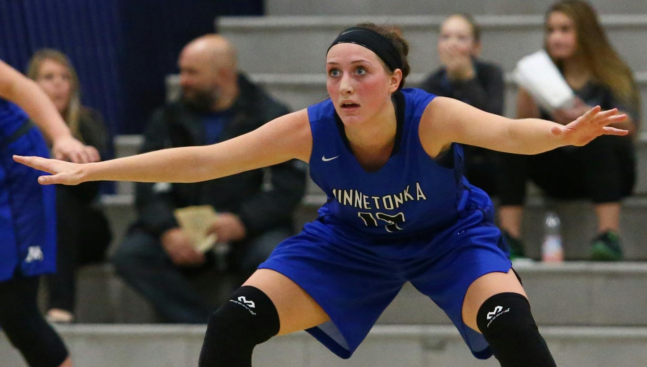 Megan Walker (#12, blue on right), Minnetonka girls' basketball, Lakeville North vs. Minnetonka Nov. 30, 2017. Photo by Cheryl Myers