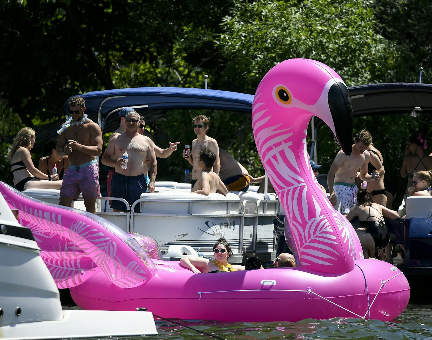 The party scene along the shore of Lake Minnetonka's Big Island Saturday afternoon. ] Aaron Lavinsky &#xa5; aaron.lavinsky@startribune.com A "deep dive" on the situation at Minnetonka's Big Island, and what, if anything, has been done to clean it up. We photograph the scene around the Big Island on Saturday, July 27, 2019 on Lake Minnetonka, Minn.