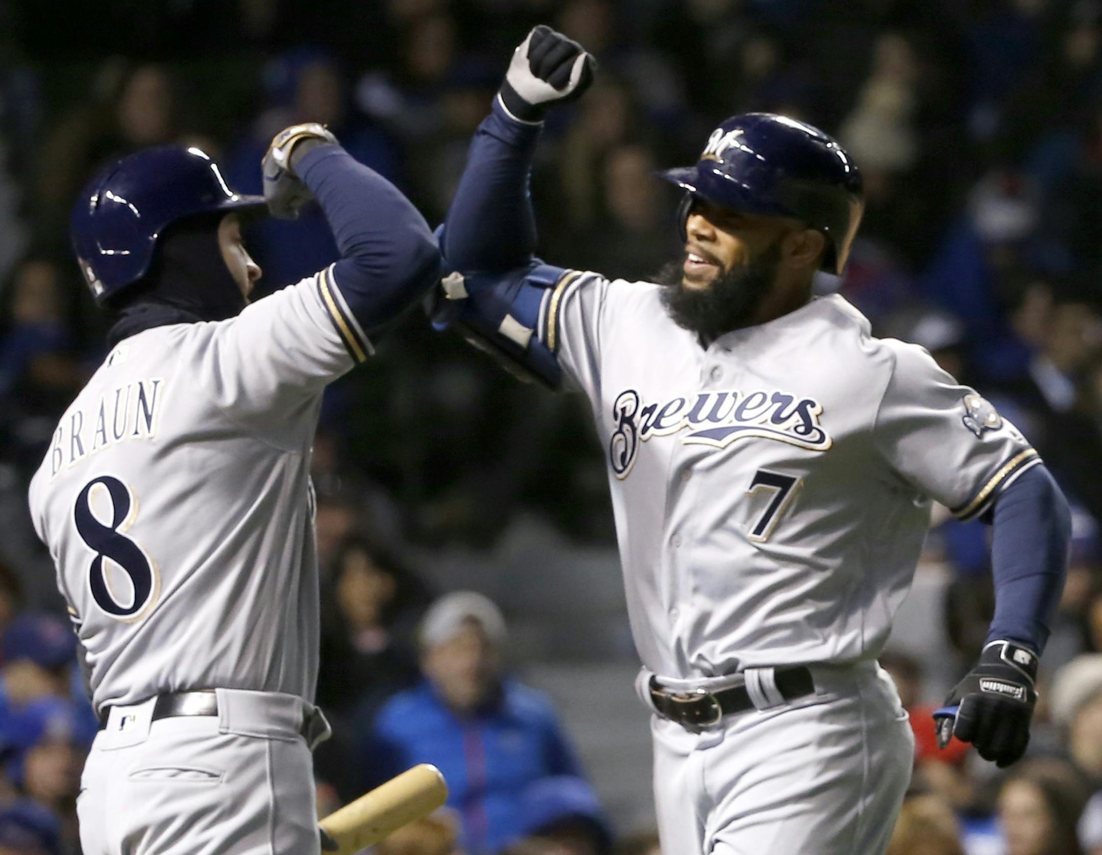 Brewers slugger Eric Thames, right, currently the top hitter in baseball with a .370 average entering the weekend — appears to remain unfazed by some not-so-subtle suspicions of steroid use.