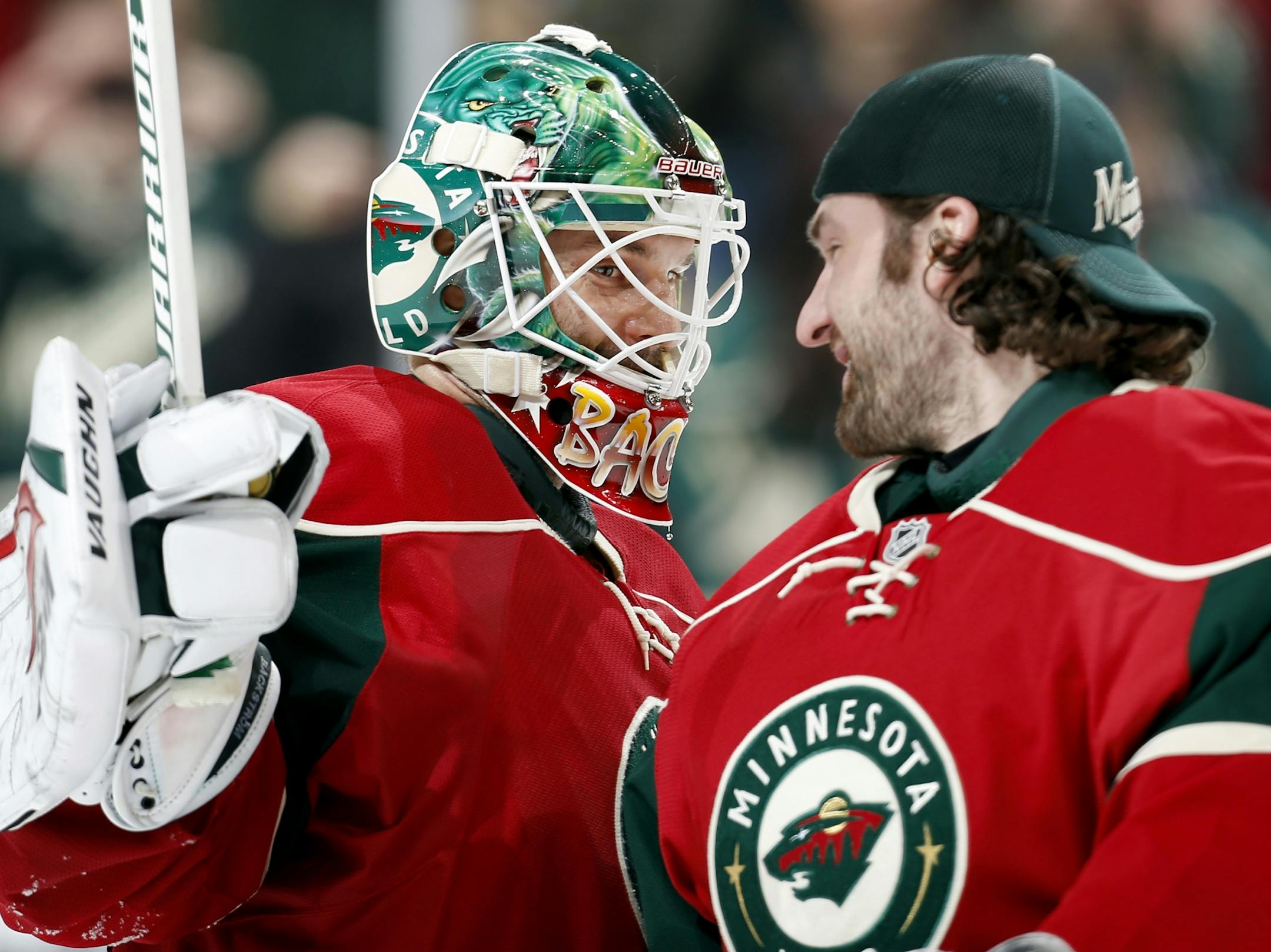 Wild goalies Niklas Backstrom (left) and Josh Harding