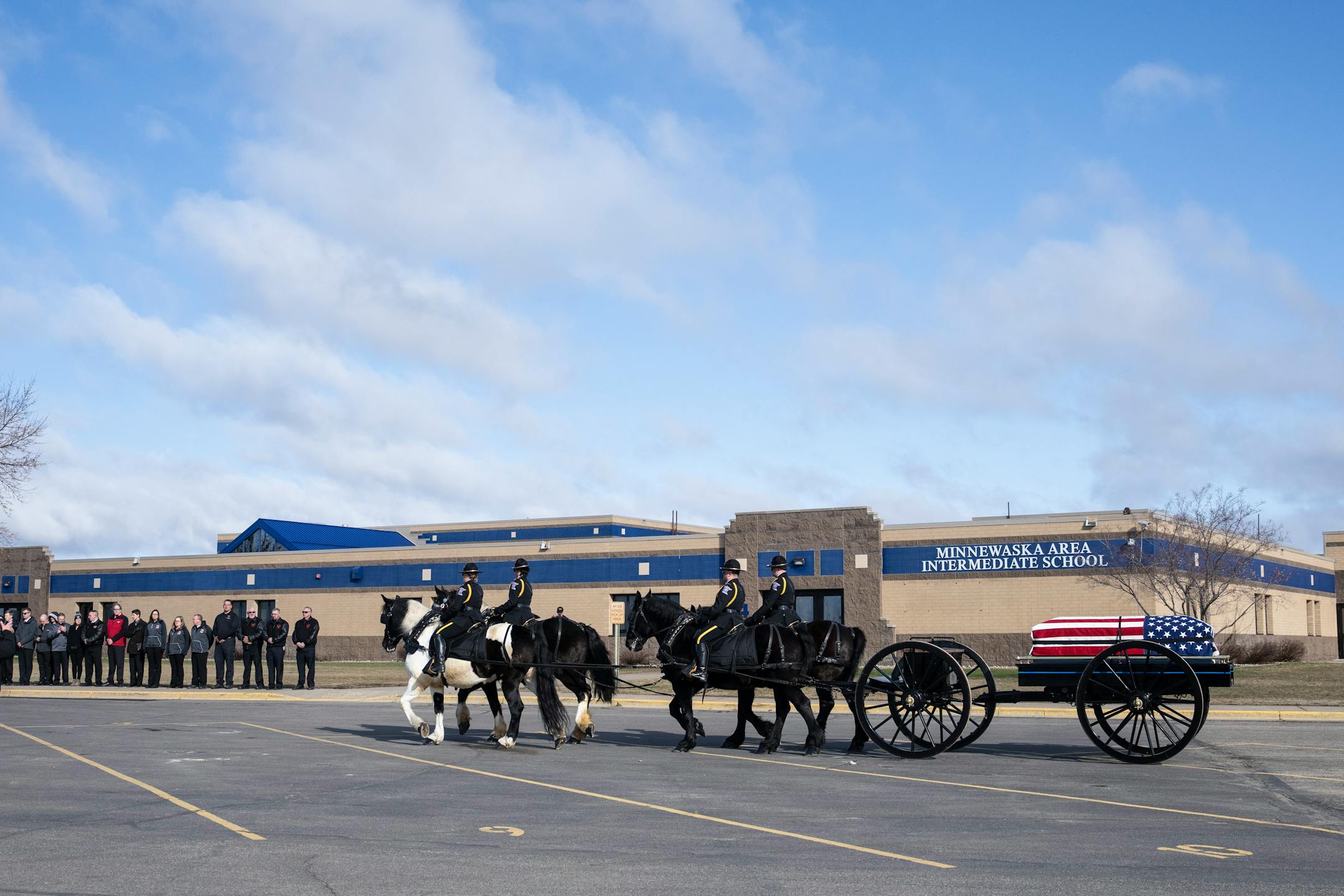 The caisson procession for Pope County deputy Josh Owen.
