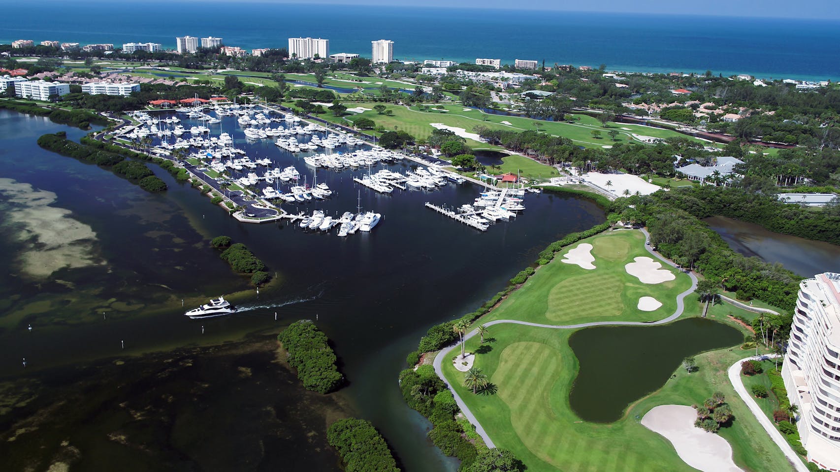The Longboat Key Club includes resort hotel, golf course, and marina.