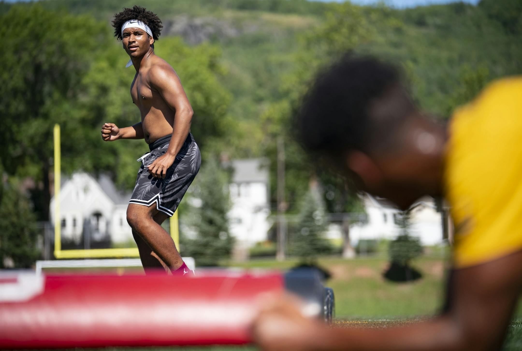 Jayden Hester did footwork over bags during the Denfeld football team's workout on Tuesday morning.
