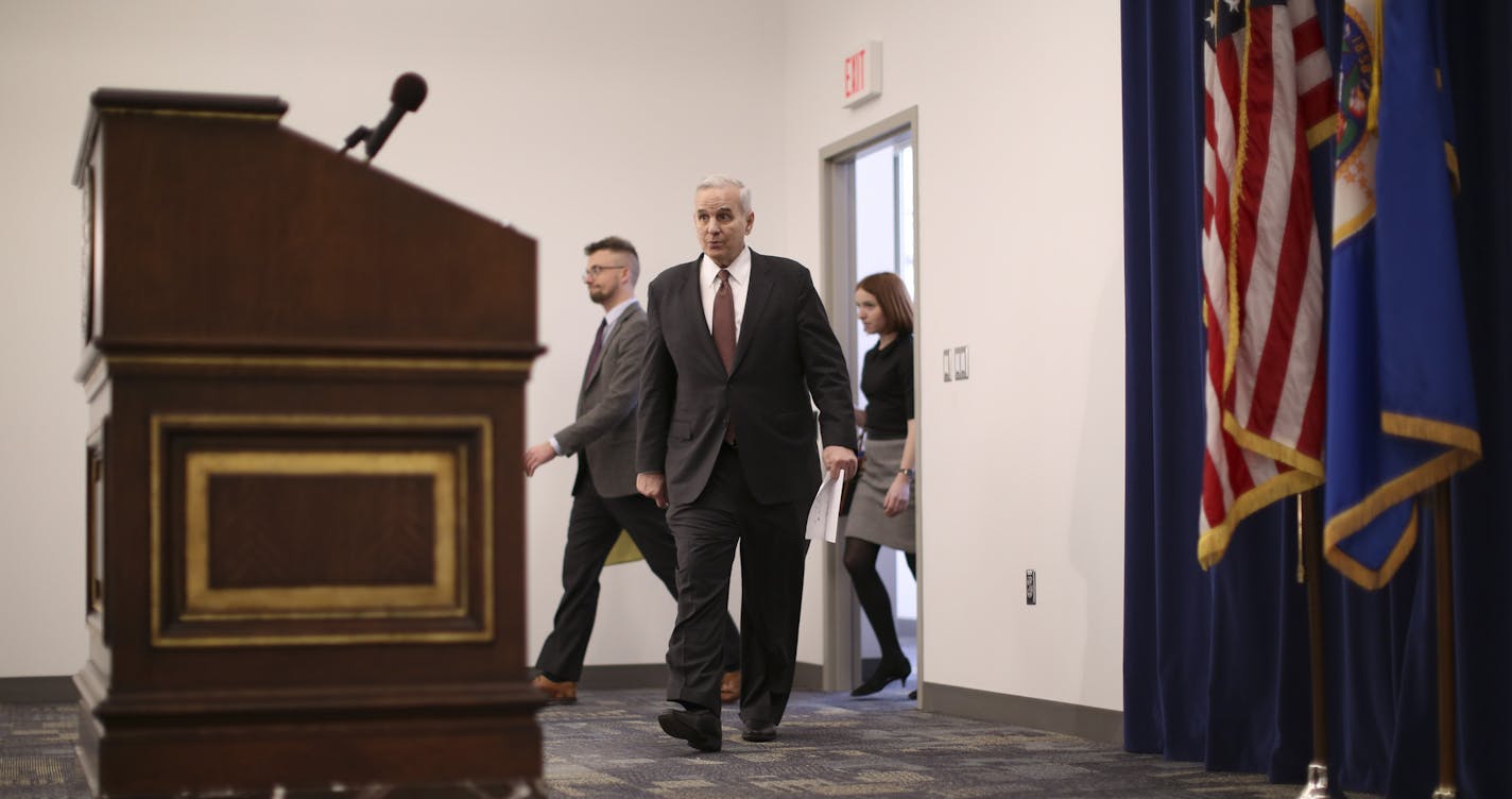 Gov. Mark Dayton walked to the podium to begin his news conference Thursday afternoon in the Veterans Service Building in St. Paul. ] JEFF WHEELER &#xef; jeff.wheeler@startribune.com Gov. Mark Dayton held a news conference Thursday, March 3, 2016 to comment on the decision by the State of Minnesota that the 10-year environmental review of Minnesota's first proposed copper nickel mine is adequate, clearing the way fro the next critical steps in PolyMet's $650 million project &#xf1; setting financ