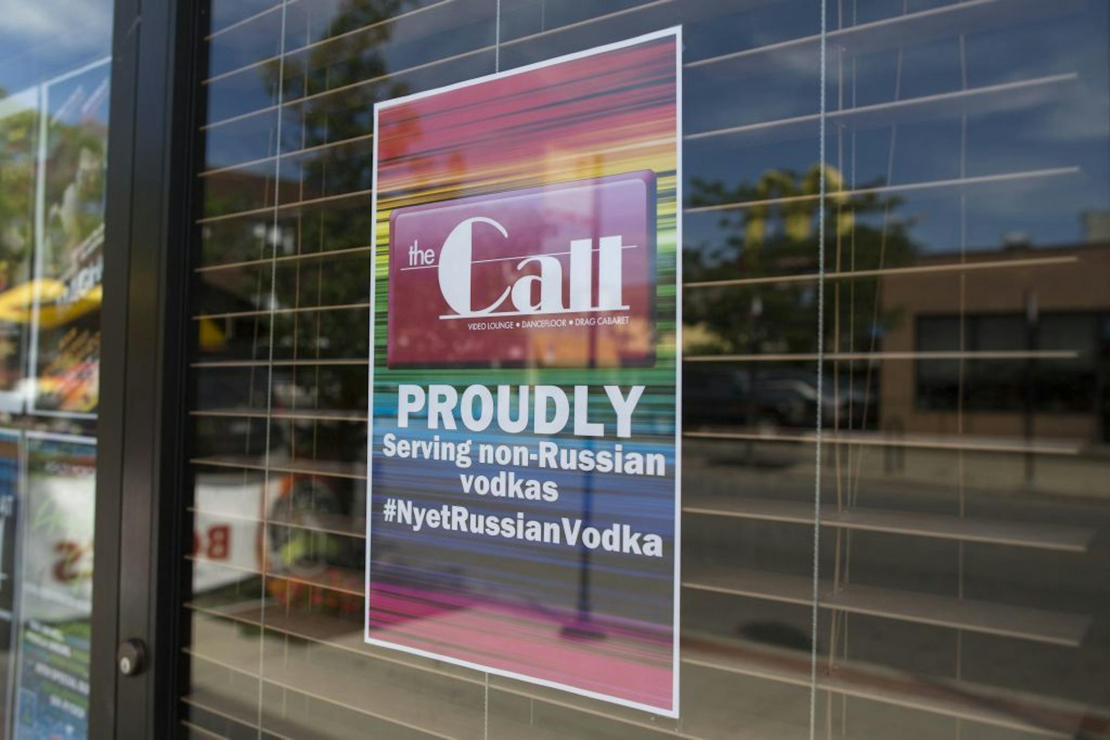 A sign outside of The Call, a gay bar on the north side of Chicago, Monday, July 29, 2013. Many gay bars across North America have joined a campaign to stop selling Russian vodka due to anti-gay laws in Russia. The chief cause of the anger is a law signed by President Vladimir Putin last month that bans the "propaganda of nontraditional sexual relations" and imposes hefty fines for providing information about the gay community to minors or holding gay pride rallies.