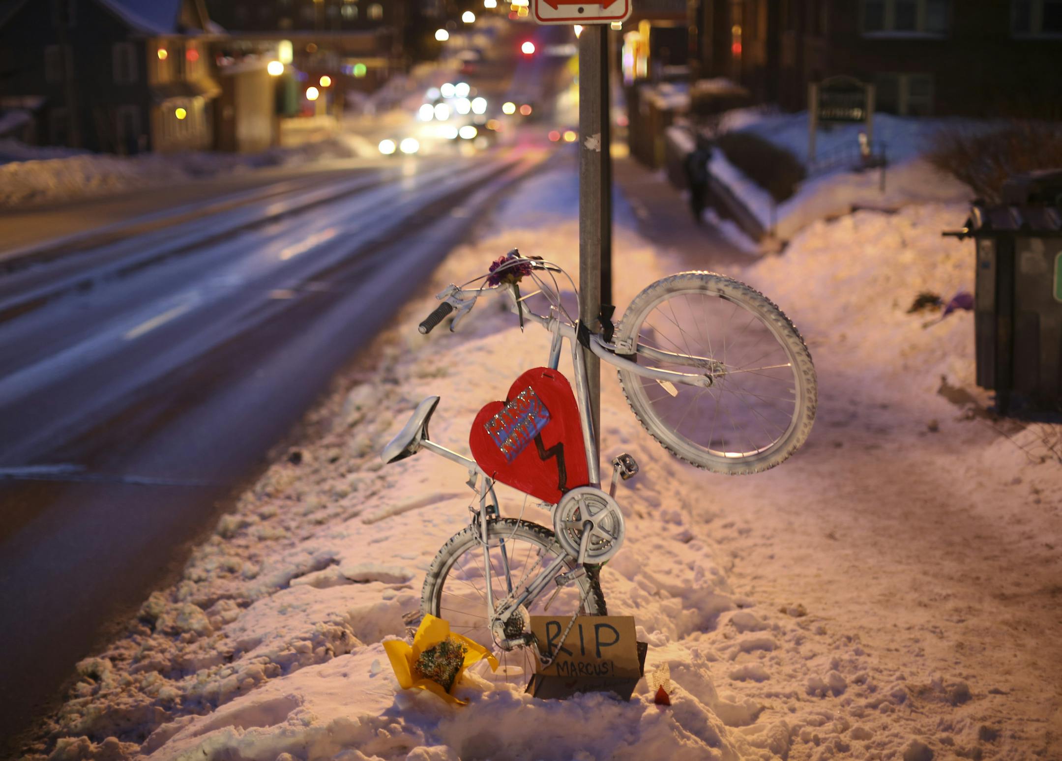 The ghost bike tribute to Marcus Nalls, 26, at the spot on W. Franklin Ave. where he was struck and killed by a van on Monday night while riding his bicycle. This photo was made Thursday evening, February 6, 2014. ] JEFF WHEELER ‚Ä¢ jeff.wheeler@startribune.com
