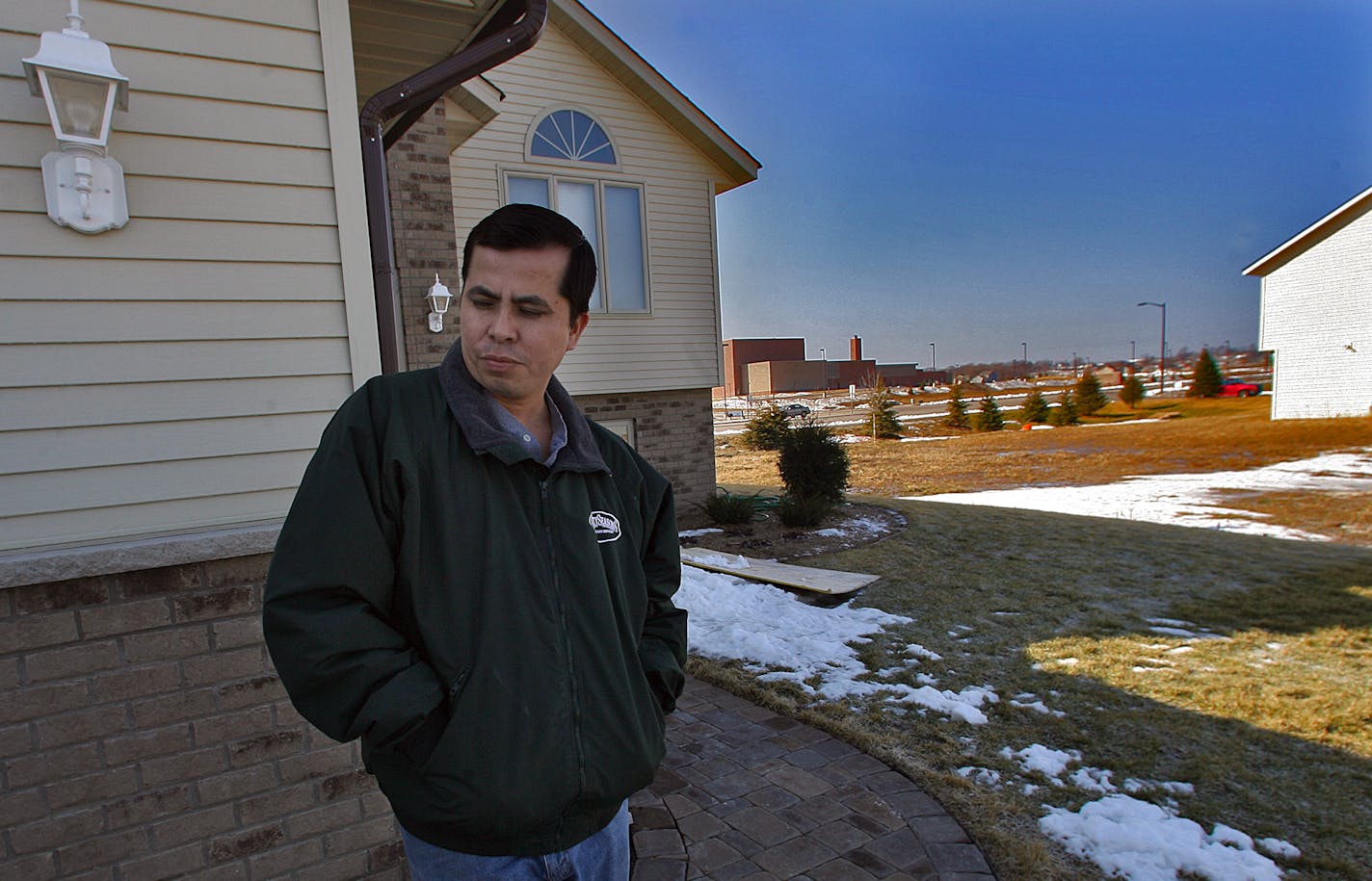 Homeowner Hector Rebolorio lives in a subdivision in Shakopee where new home starts have slowed.