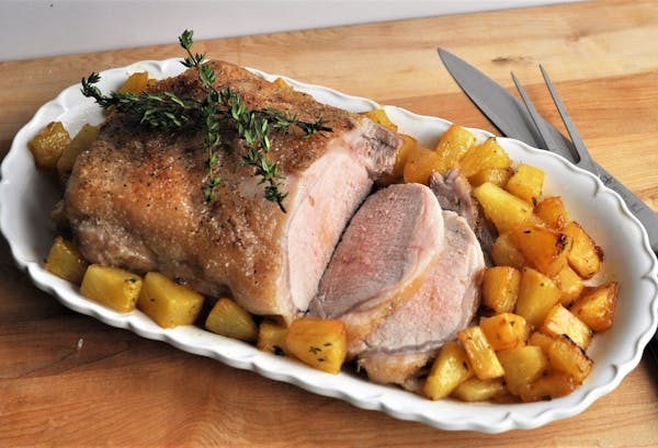Pork Loin With Honey-Thyme Roasted Pineapple.