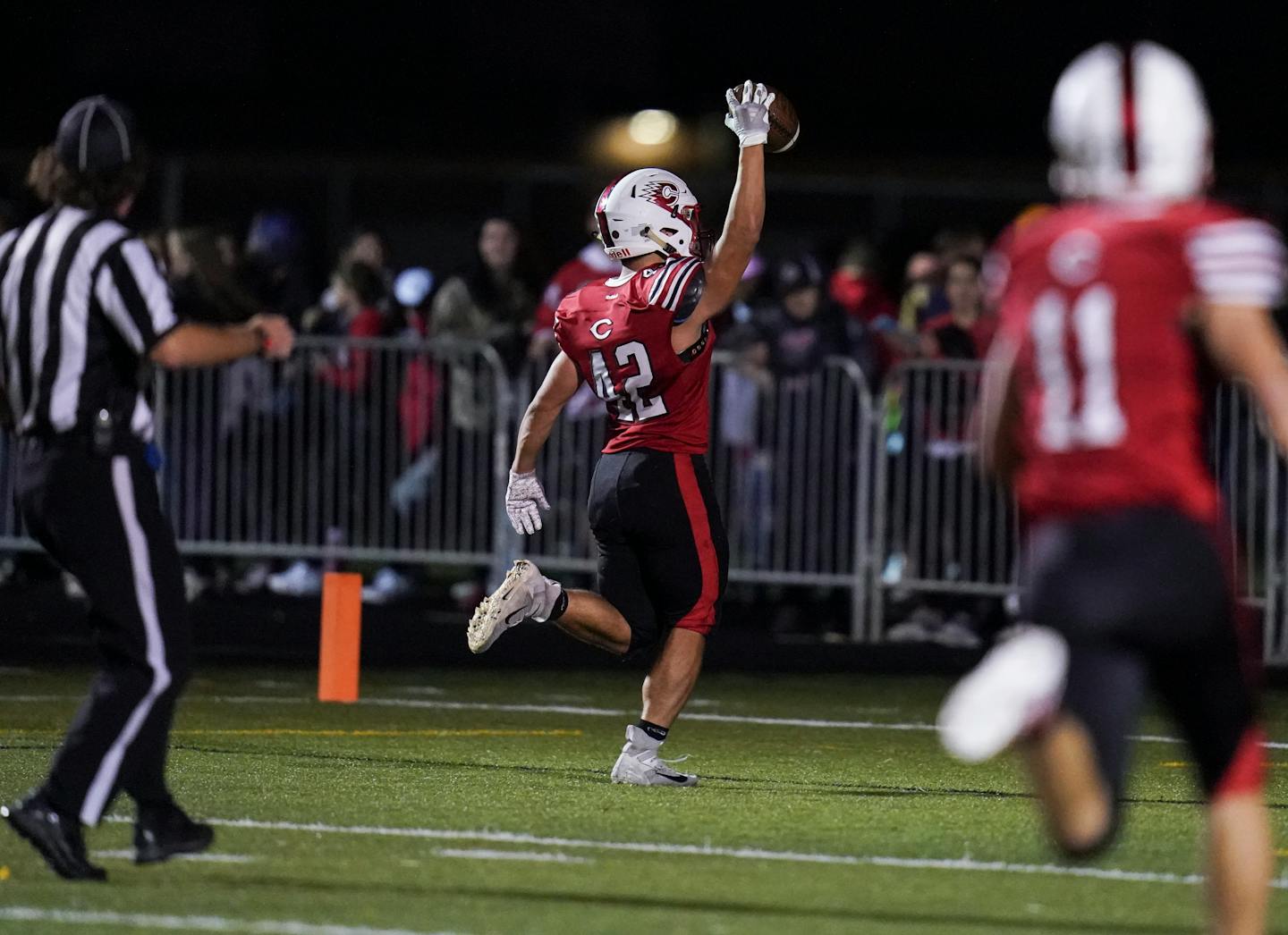 Centennial's running back Lance Liu (42) ran half the field for a touchdown in the fourth quarter bring Centennial ahead 21-7.