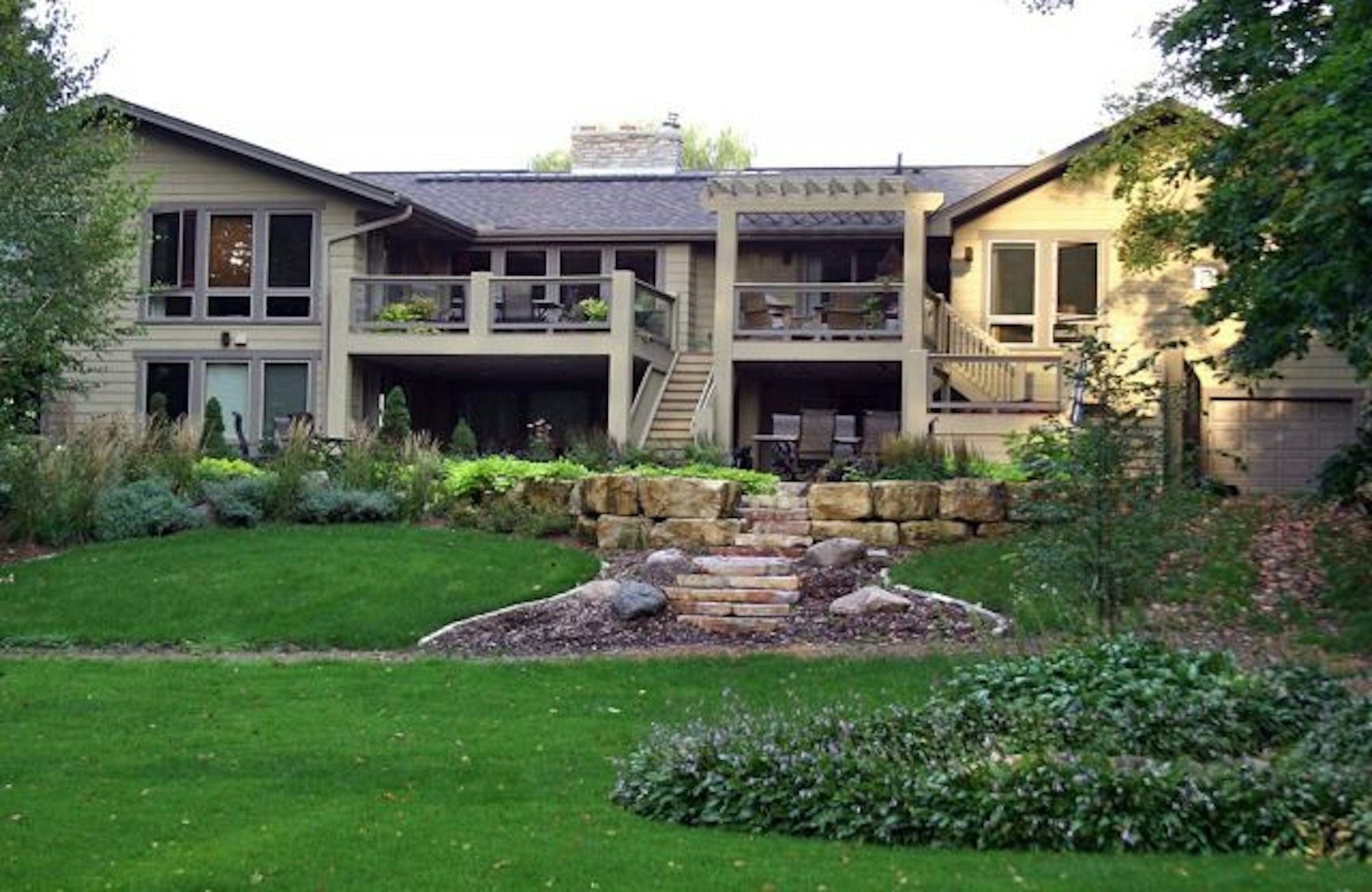 Rear view of the landscaping and house of the late Leon Snyder.