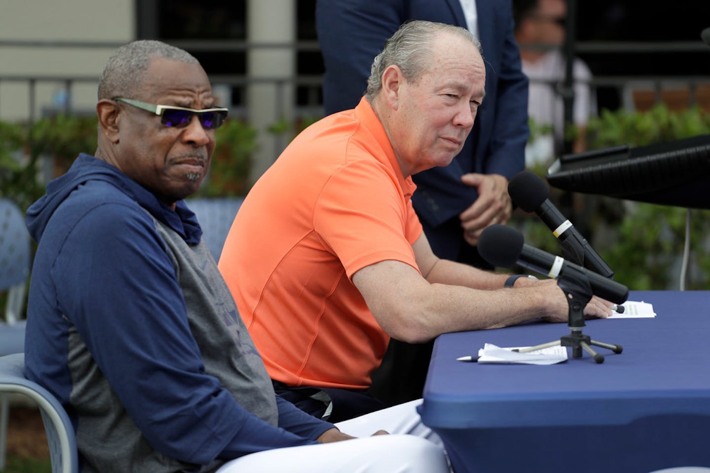 Houston Astros owner Jim Crane, right, and manager Dusty Baker listen to a question during a news conference on Thursday.