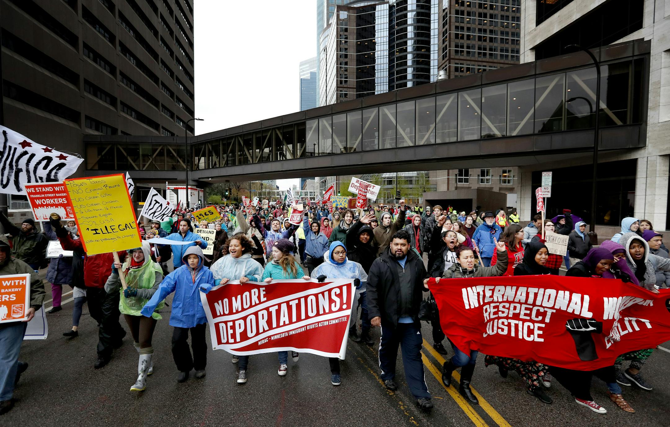 Demonstrators made their way down 3rd Avenue South in downtown Minneapolis on the way to the City Hall. ] CARLOS GONZALEZ ï cgonzalez@startribune.com - May 1, 2017, Minneapolis, MN, The May Day March and others Downtown Minneapolis Federal Building