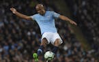 Manchester City's Vincent Kompany scored the match's only goal Monday in the English Premier League soccer match between Premier League leader Manches