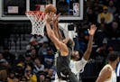 The Timberwolves’ Rudy Gobert, above playing against the Los Angeles Lakers on Oct. 28, will return to the lineup Wednesday against the Suns after m