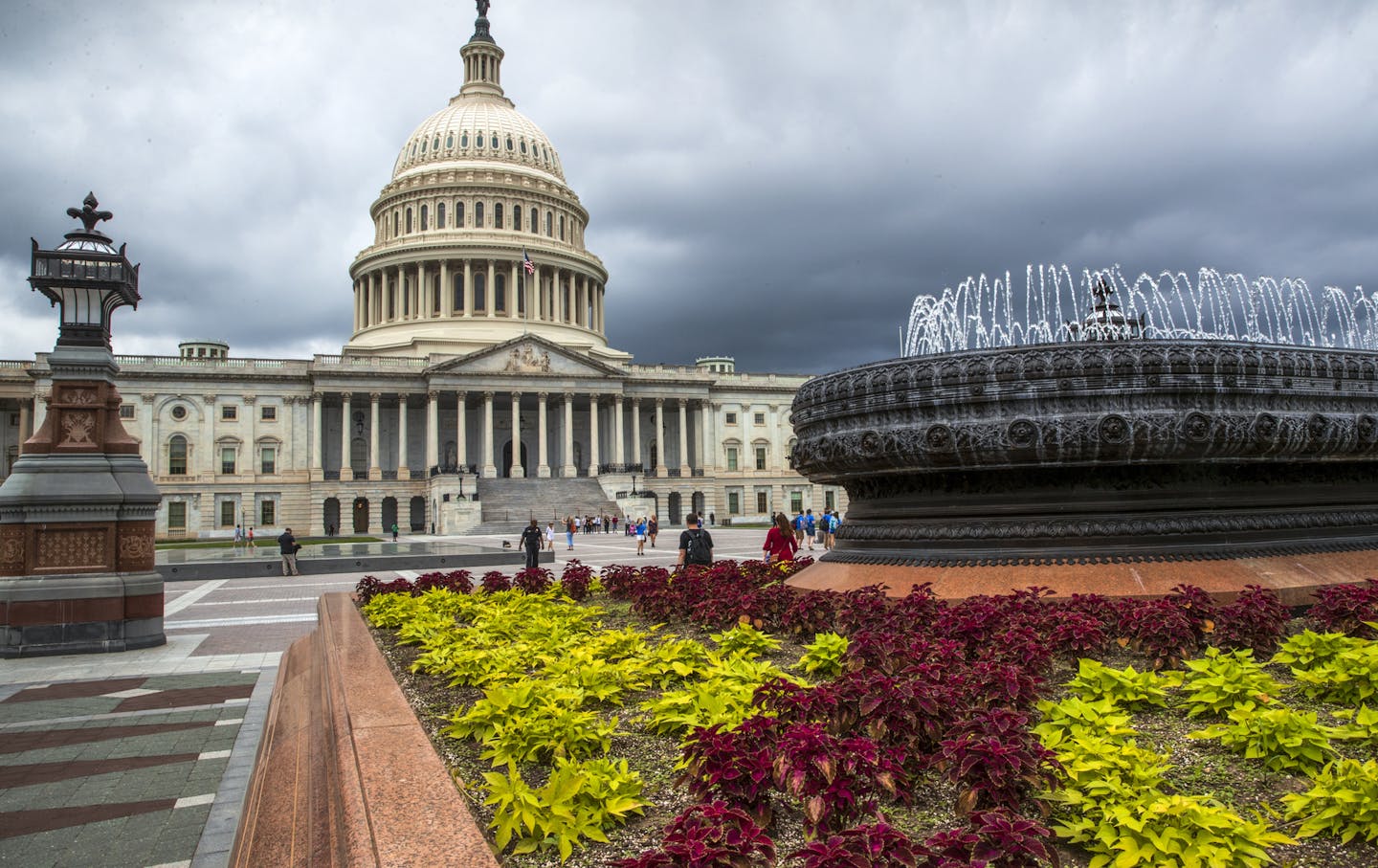 FILE- In this May 30, 2018, file photo the East Front of the U.S. Capitol in Washington is seen under stormy skies. The federal government piled up a record deficit in April, traditionally a month of big budget surpluses. The sea of red ink is being created by a drop in revenue and a massive increase in spending to fund efforts to deal with the coronavirus pandemic. The Treasury Department said Tuesday, May 12, 2020 that the government racked up a shortfall of $737.9 billion last month. That was