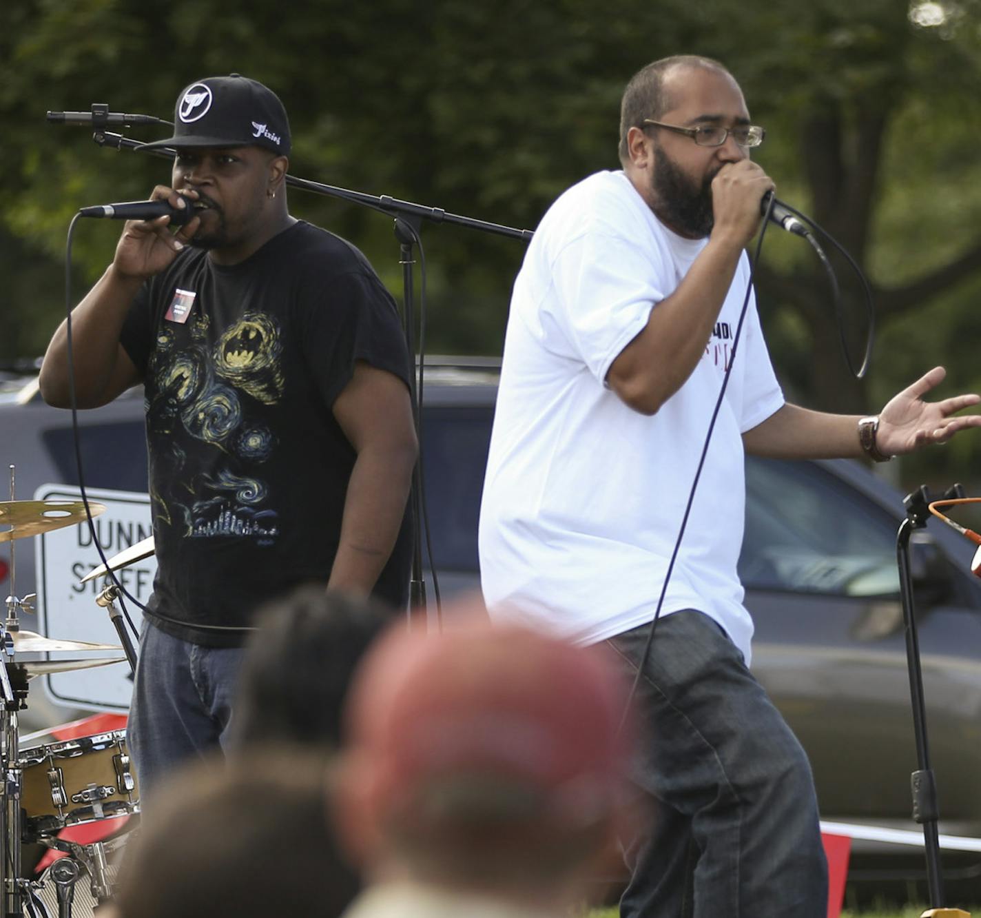 Heiruspecs, the band that formed when its members were still at Central High School drew a strong crowd to the Dunning Recreation Center for the event to honor Philando Castile Sunday afternoon. The vocalists are Muad'dib, left, and Felix, with Peter Leggett on drums and Sean McPherson on bass. ] JEFF WHEELER &#x2022; jeff.wheeler@startribune.com Alums of Central High School in St. Paul organized an event Sunday afternoon, August 21, 2016 to help fund a St. Paul Central Foundation scholarship in