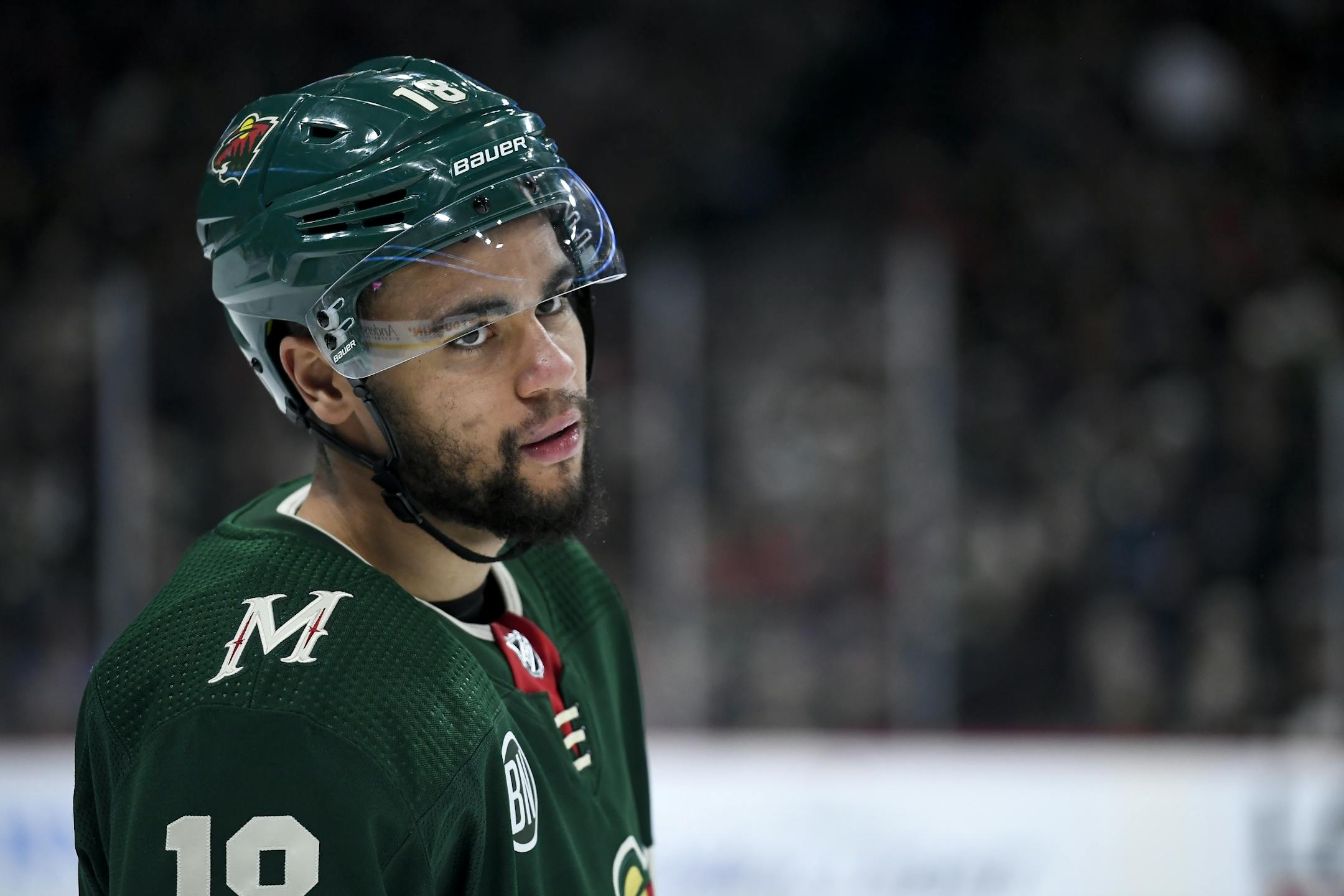 Minnesota Wild left wing Jordan Greenway (18) looked on during a second period break in the action against the Los Angeles Kings.
