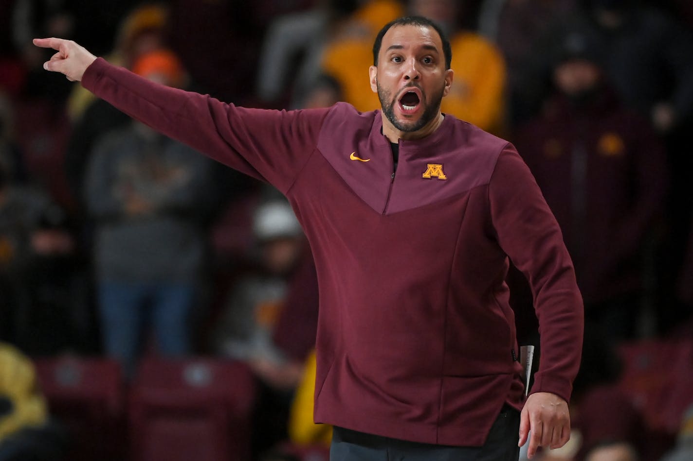 Minnesota Gophers head coach Ben Johnson directs the team during the second half of an NCAA men's basketball game between Minnesota and Purdue at Williams Arena in Minneapolis, Minn.