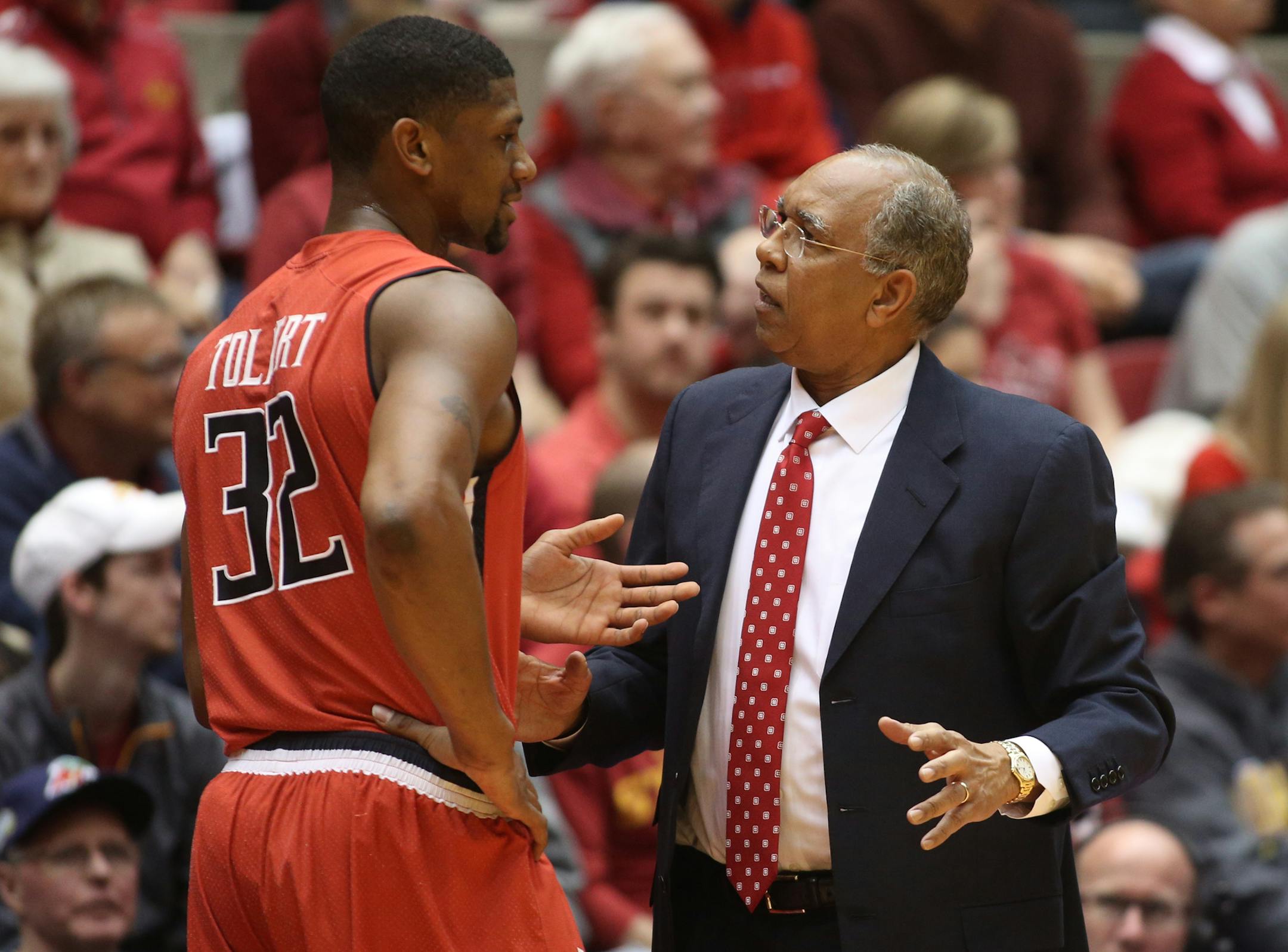 Texas Tech head coach Tubby Smith talks with forward Jordan Tolbert after taking him out of the game during the first half of an NCAA college basketball game against Iowa State in Ames, Iowa, Saturday, Feb. 15, 2014. (AP Photo/Justin Hayworth) ORG XMIT: IAJH