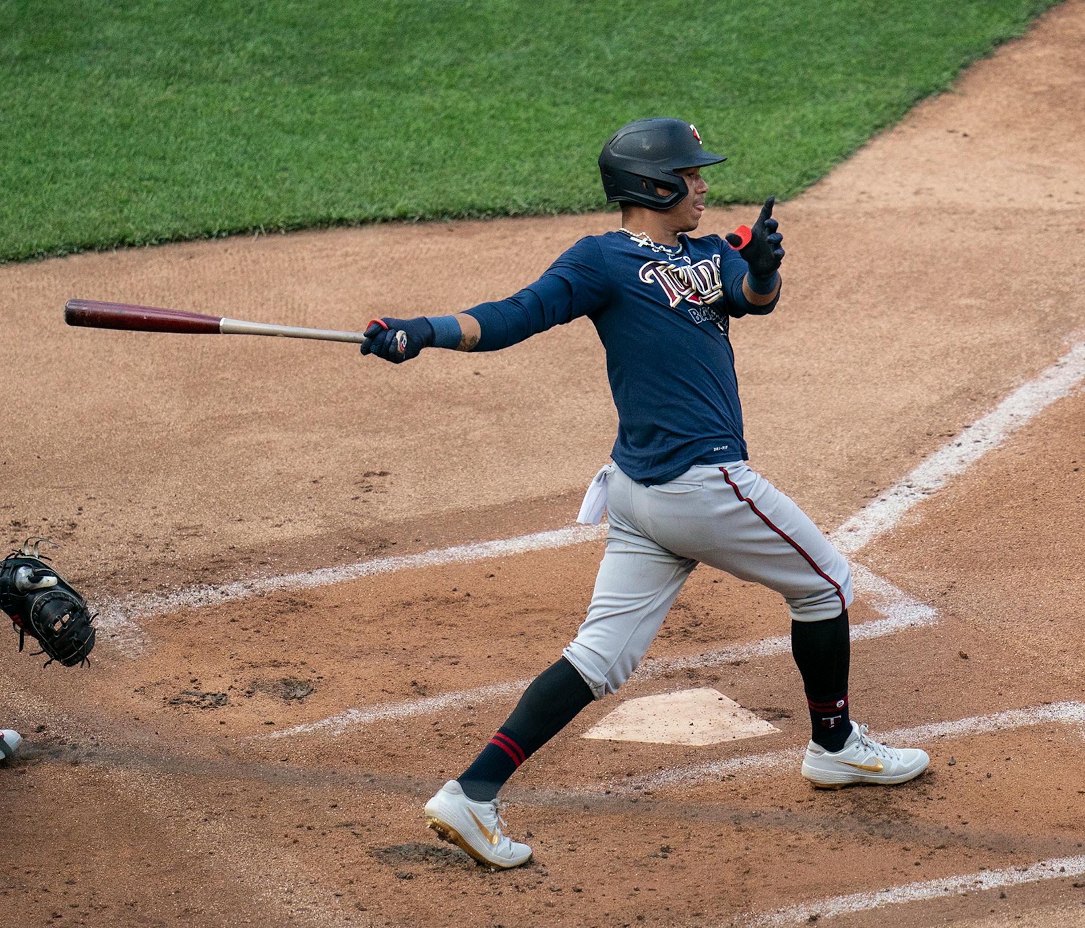 Minnesota Twins shortstop Ehire Adrianza (13) hit the ball during a scrimmage at practice at Target Field in Minneapolis, Minn., on Wednesday, July 8, 2020.