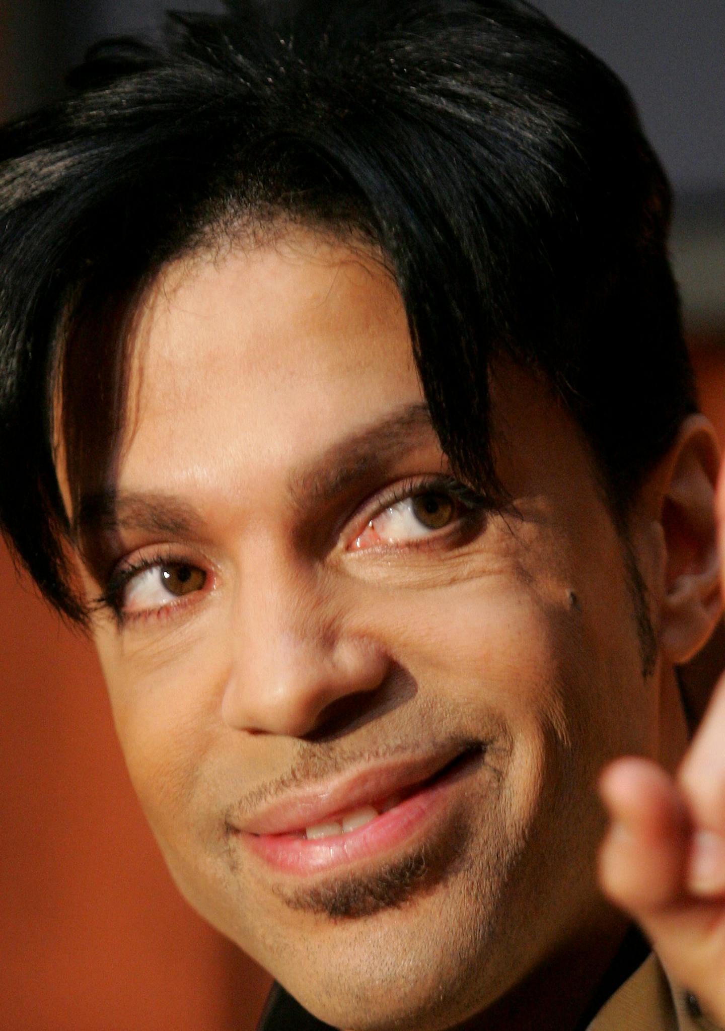 Recording artist Prince speaks during a news conference about his exclusive recording agreement between himself and Universal Records and his new single "Te Amo Corazon," Tuesday, Dec. 13, 2005, in Beverly Hills, Calif. Prince's new album "3121" will be his first with Universal Records with a scheduled release in 2006. (AP Photo/Danny Moloshok) ORG XMIT: CADM101