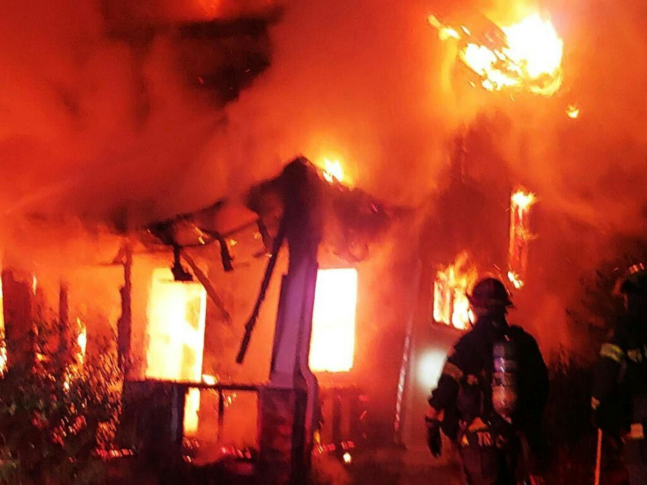 Fire crews arrived Friday night to find a 2½-story home in the 3500 block of Holmes Avenue in flames.