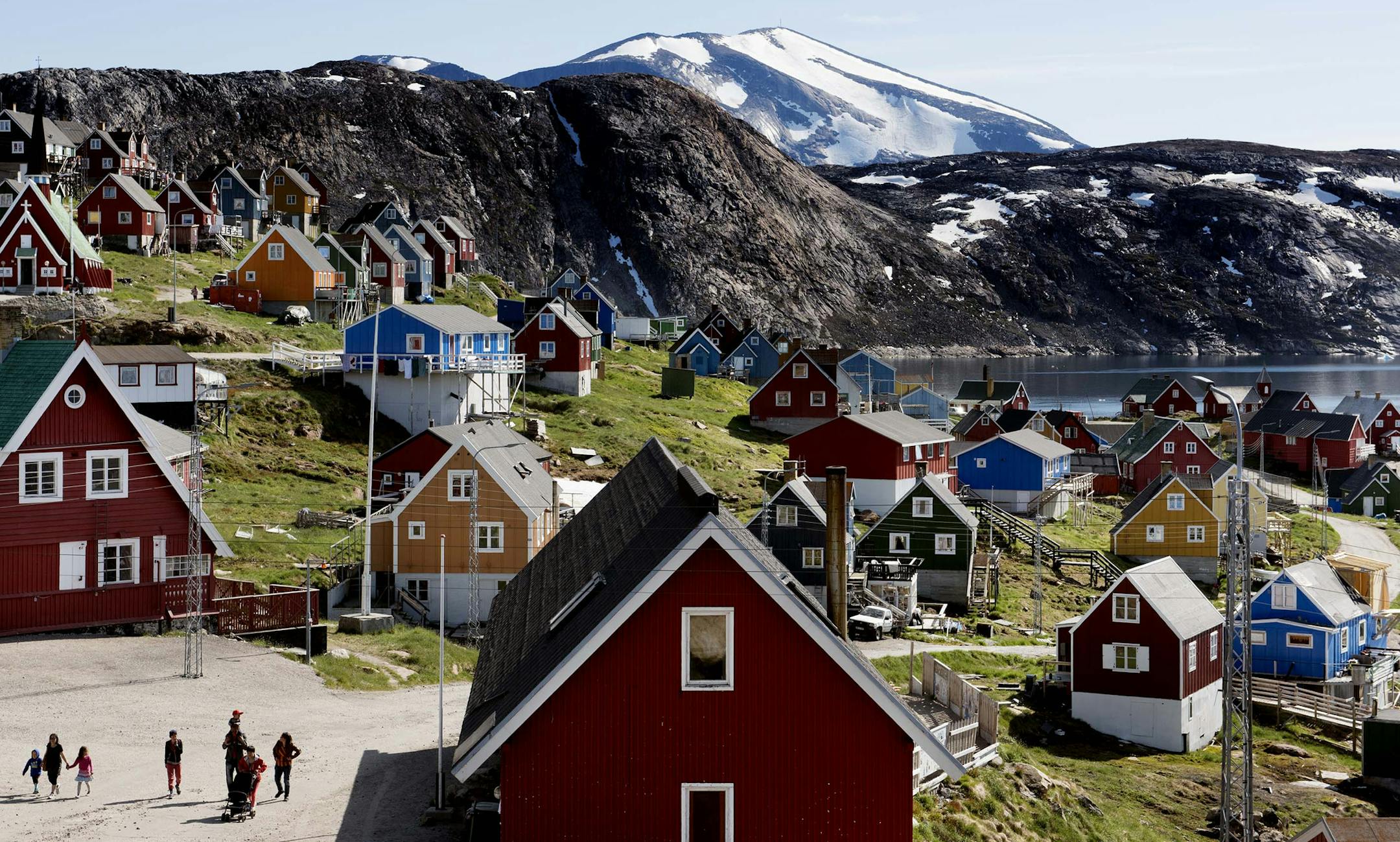 FILE - This July 11, 2015 file photo shows a general view of the town of Upernavik in western Greenland. Aiming to put his mark on the world map, President Donald Trump has talked to aides and allies about buying Greenland for the U.S. A Trump ally told The Associated Press on Thursday, Aug. 15, 2019 that the president had discussed the purchase but was not serious about it. And a Republican congressional aide said Trump brought up the notion of purchasing Greenland in conversations with lawmake