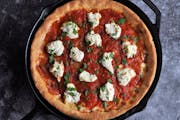 Hot Soppressata and Ricotta Skillet Pizza is similar to the deep-dish variations you'd find in Chicago. Meredith Deeds, Special to the Star Tribune