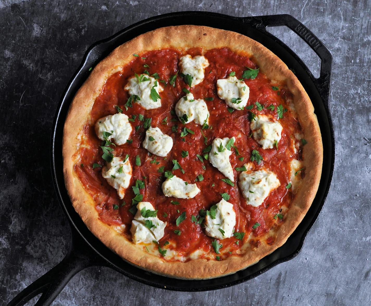 Hot Soppressata and Ricotta Skillet Pizza is similar to the deep-dish variations you'd find in Chicago. Meredith Deeds, Special to the Star Tribune