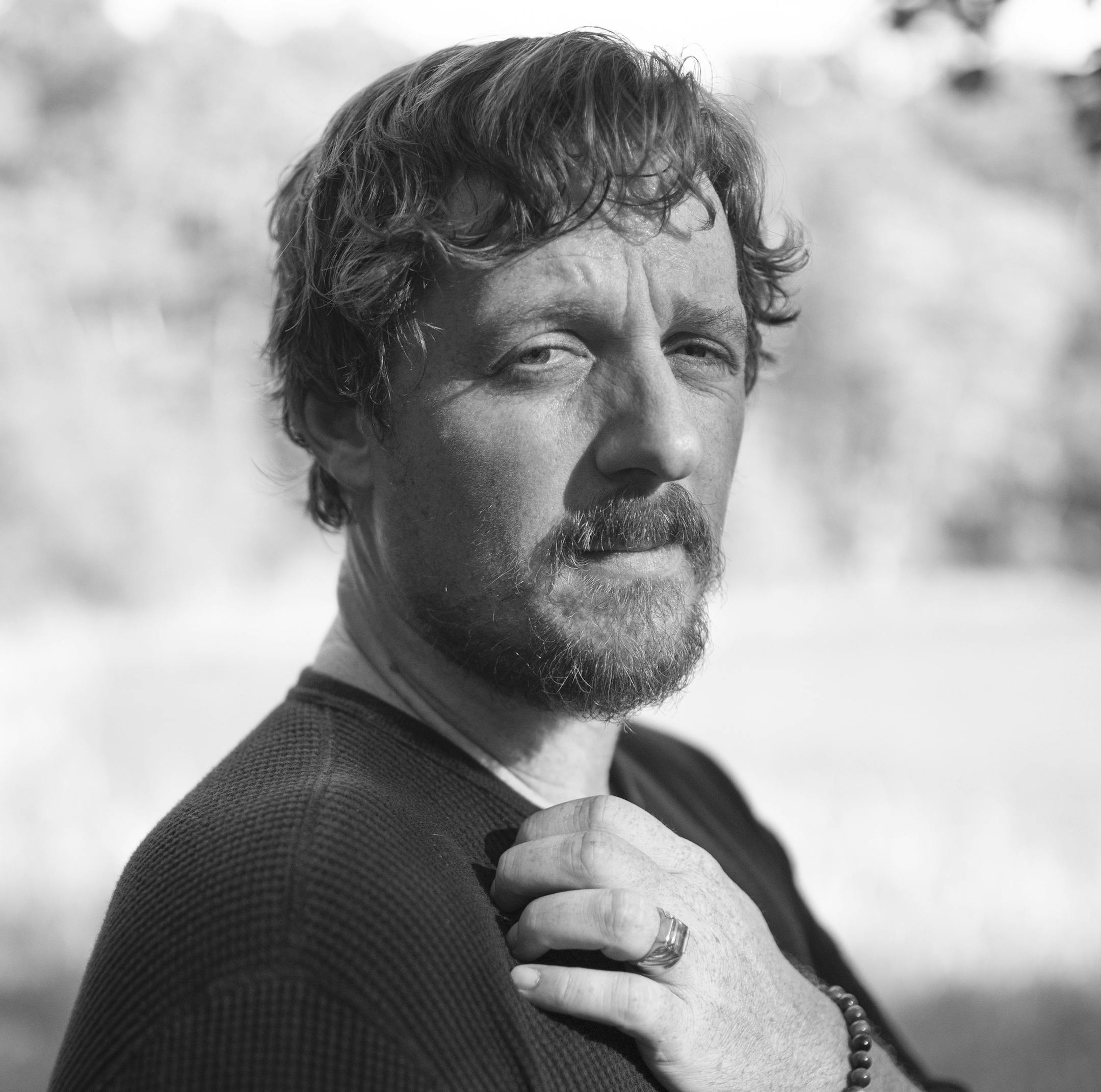 Singer Sturgill Simpson, the Nashville disrupter who won a Grammy Award for his 2016 album, "A Sailor's Guide to Earth," on his property in Sewanee, Tenn., Sept. 12, 2019. Simpson, whose new album, "Sound & Fury" debuts Sept. 27, 2019, refuses to be what others want him to be. (Kristine Potter/The New York Times)