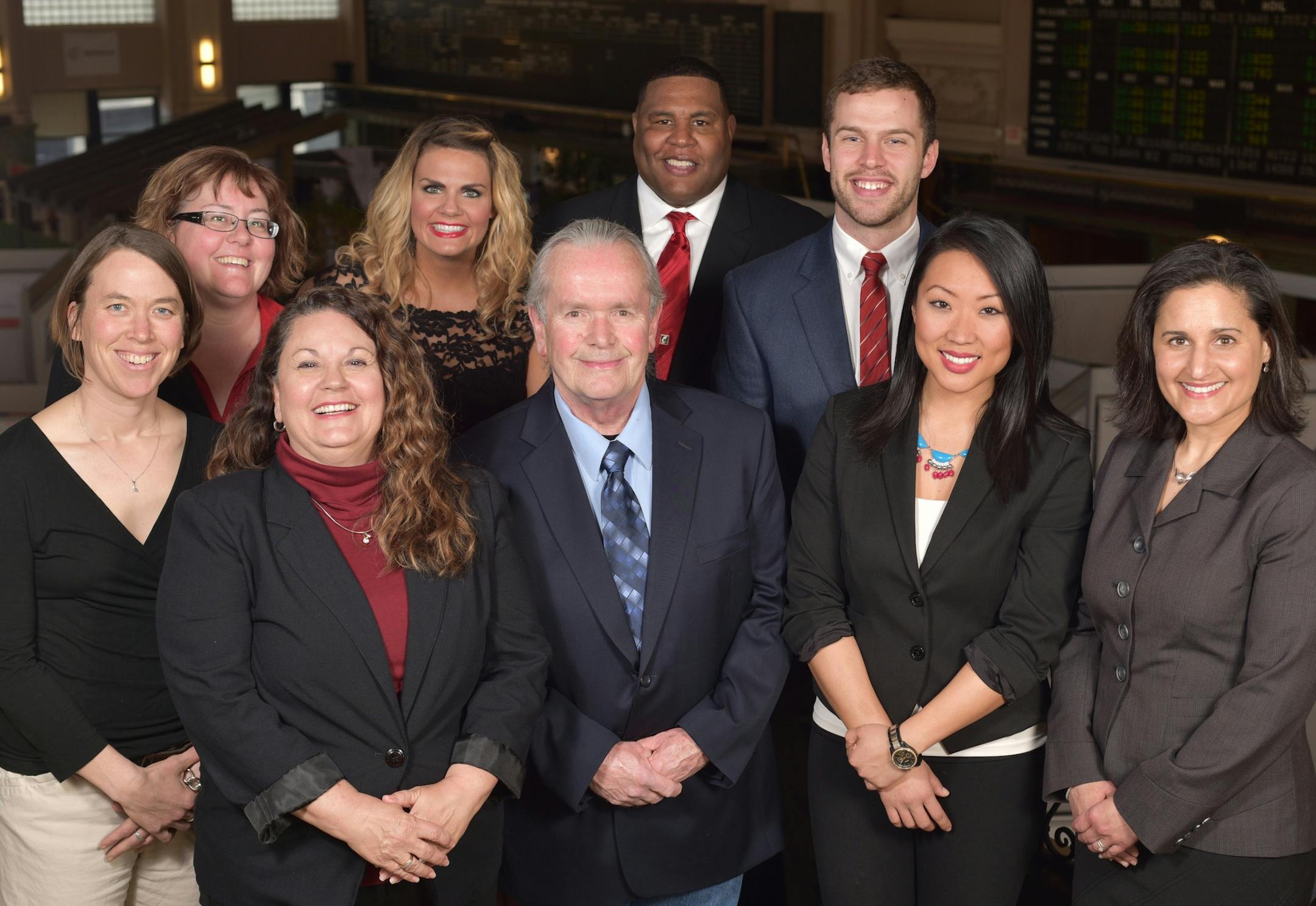 Veteran businessman Kevin Ward (second row, second from right) has joined Management HQ as president. CEO and founder Dara Rudick (first row, far right), a veteran of the association management business, opened the company in 2012.