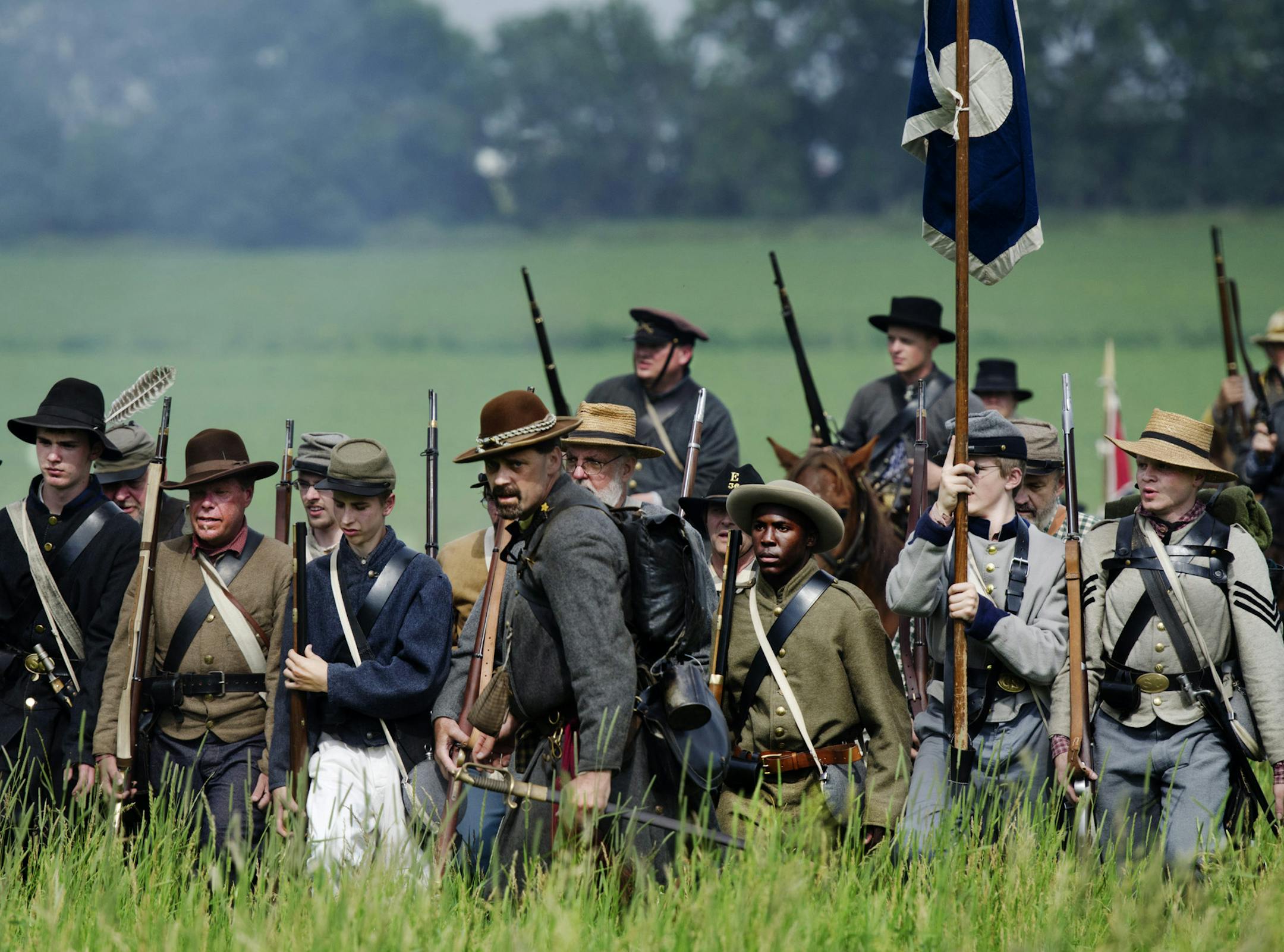 DAVID BREWSTER ¬¥ dbrewster@startribune.com Friday 06/24/11 Wasioja ] The Rebel line advancing in a re-enactment of the Battle of Chickamauga held in Wasioja Friday. ORG XMIT: MIN2013091916502465