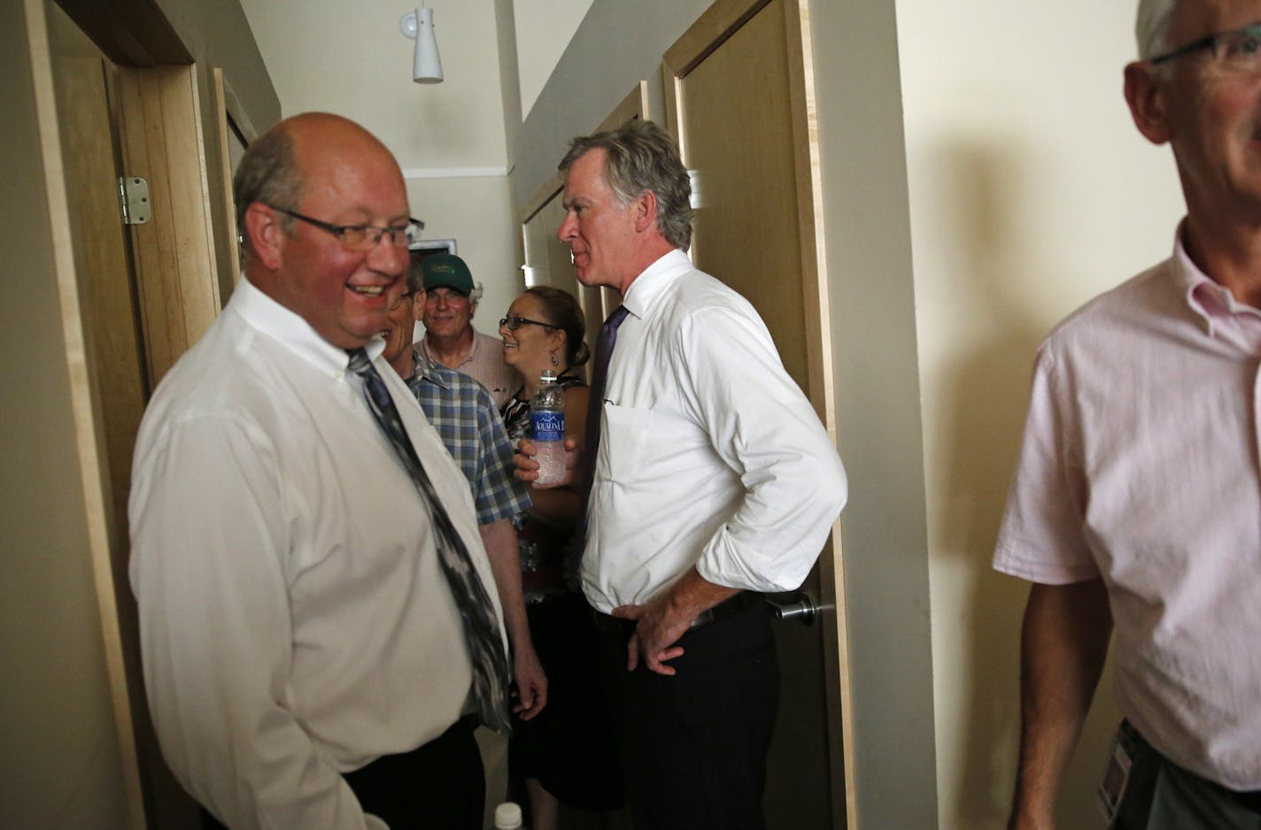 Guests including St. Paul Mayor Chris Coleman, center, checked out an apartment at the former Schmidt Brewery property on Monday.