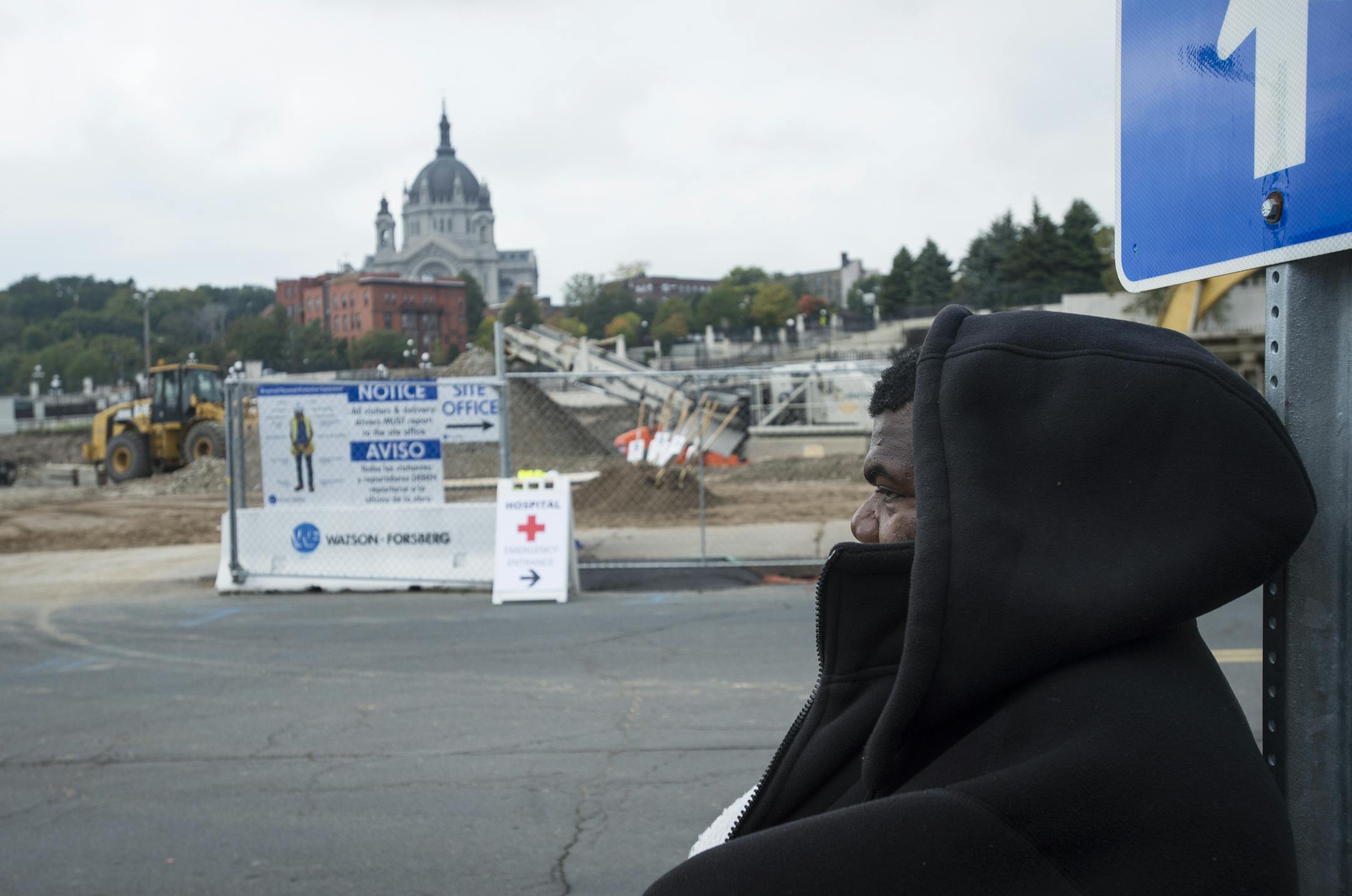 Justin Willis, a client of Catholic Charities in St. Paul, looked on while hanging out near the construction site for the new Dorothy Day Center in St. Paul. ] Aaron Lavinsky • aaron.lavinsky@startribune.com Catholic Charities, elected officials and business leaders gathered in downtown St. Paul Thursday to break round on the new Dorothy Day Center. The new, two-building campus to prevent homelessness, is going up because the current facility is overcrowded. Photographed Thursday, Oct. 8,