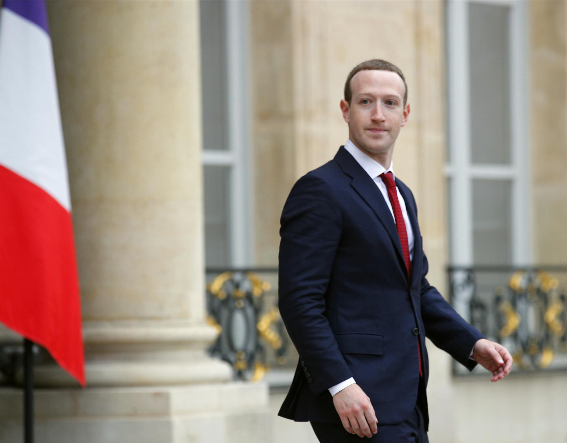 Facebook CEO Mark Zuckerberg leaves the Elysee Palace after his meeting with French president Emmanuel Macron, in Paris, Friday, May 10, 2019. Zuckerberg is meeting French President Emmanuel Macron as the tech giant and France try to pioneer ways of fighting hate speech and violent extremism online. (AP Photo/Francois Mori)