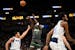 Minnesota Timberwolves guard Anthony Edwards (5) fades back for a three-pointer in the first half against the Mavericks earlier this season. The two t