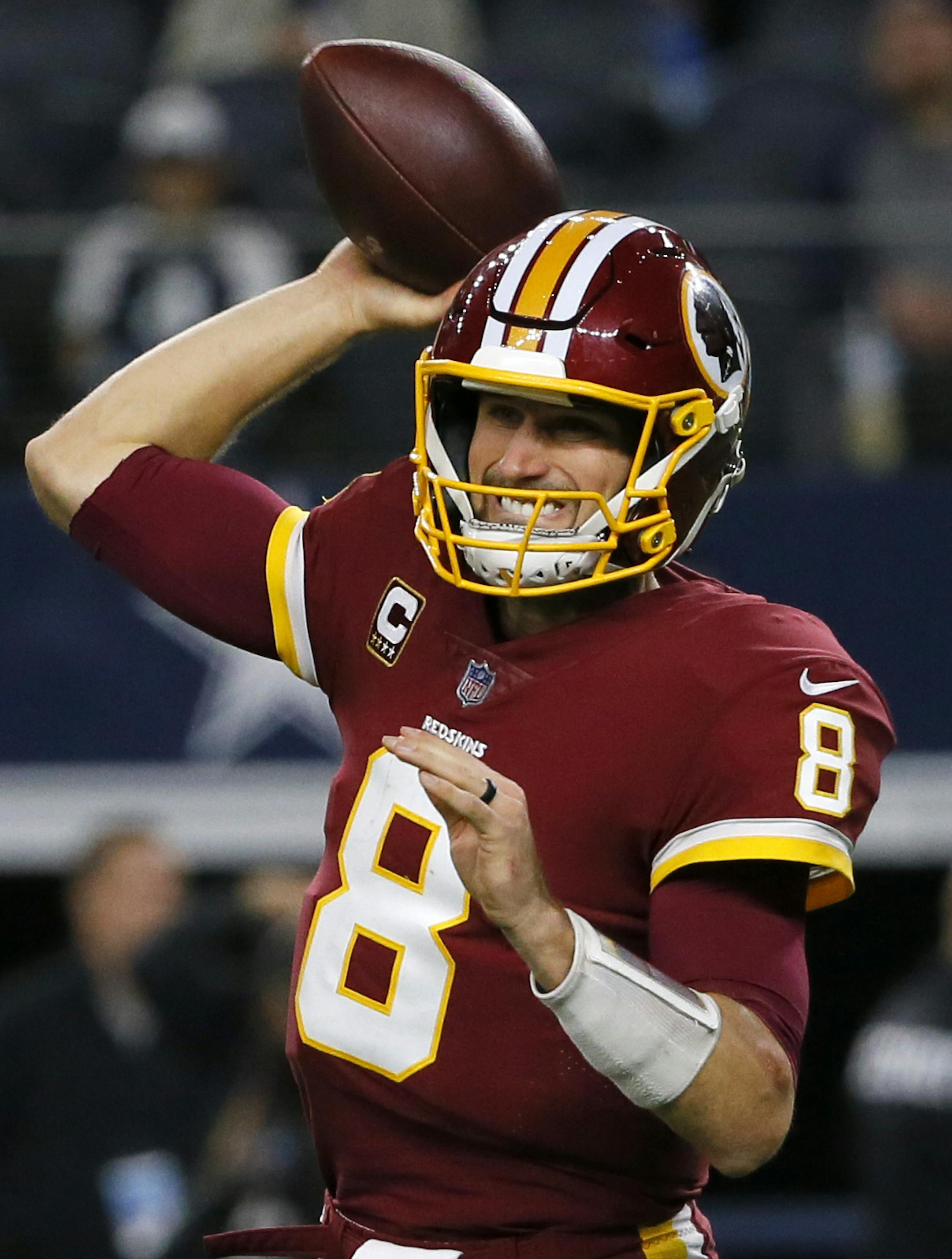 Washington Redskins quarterback Kirk Cousins (8) throws a pass during an NFL football game against the Dallas Cowboys on Thursday, Nov. 30, 2017, in Arlington, Texas. (AP Photo/Roger Steinman)