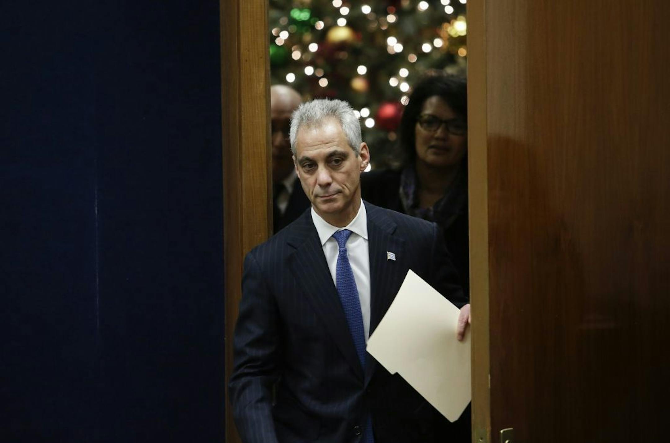 FILE -- Chicago Mayor Rahm Emanuel enters a news conference at City Hall in Chicago, Dec. 7, 2015. A former congressman and chief of staff to President Barack Obama, Emanuel has long been known for a swaggering, abrasive personal style. But with his political career under siege, he has been showing a more contrite side, to mixed results.