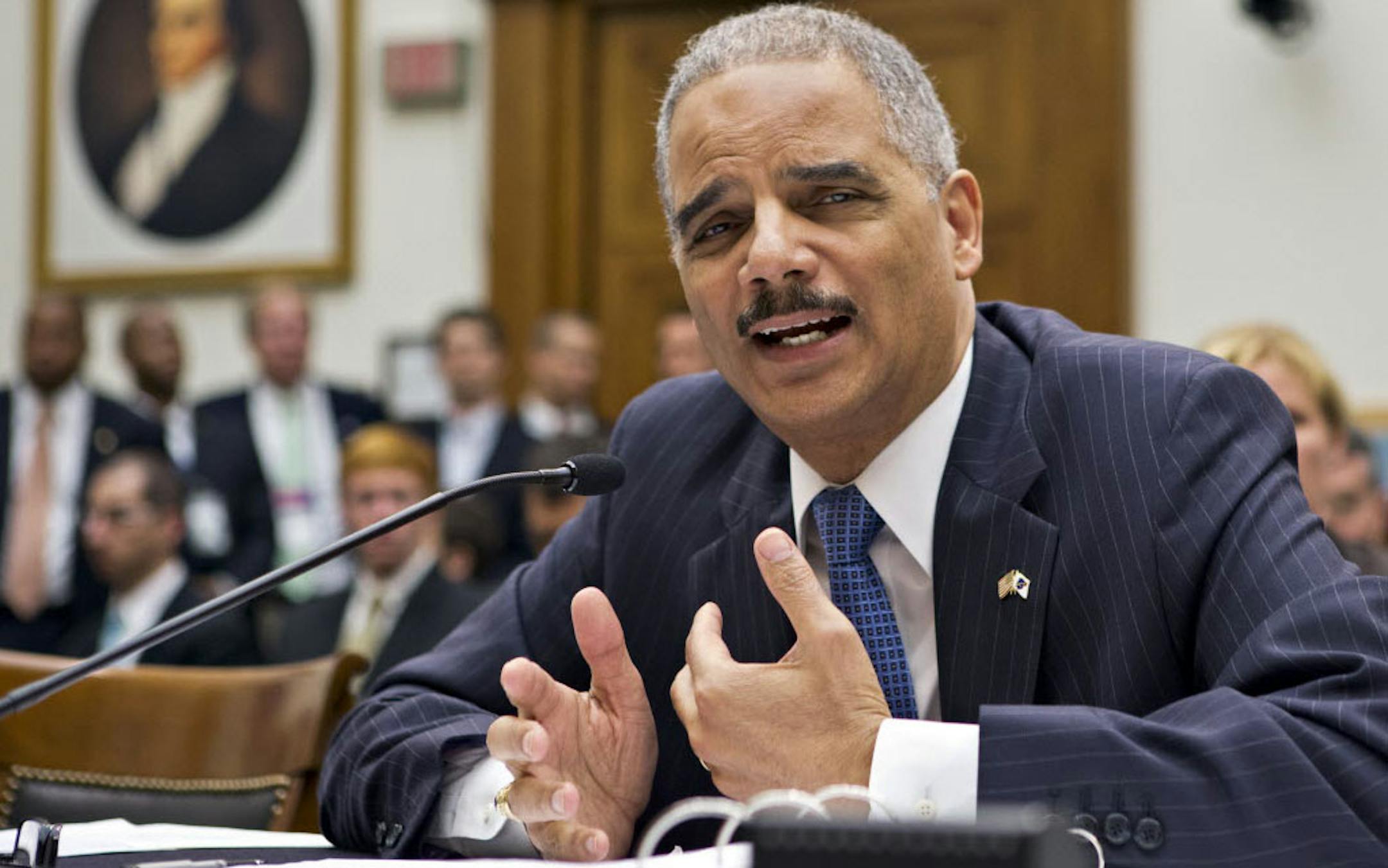 Attorney General Eric Holder, the nation's top law enforcement official, testifies on Capitol Hill in Washington, Wednesday, before the House Judiciary Committee oversight hearing on the U.S. Department of Justice.