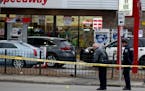 The scene near 25th St. and Bloomington Ave. S, where a man was seriously wounded by gunfire in the parking lot of a Speedway Tuesday, Nov. 6, 2018, i