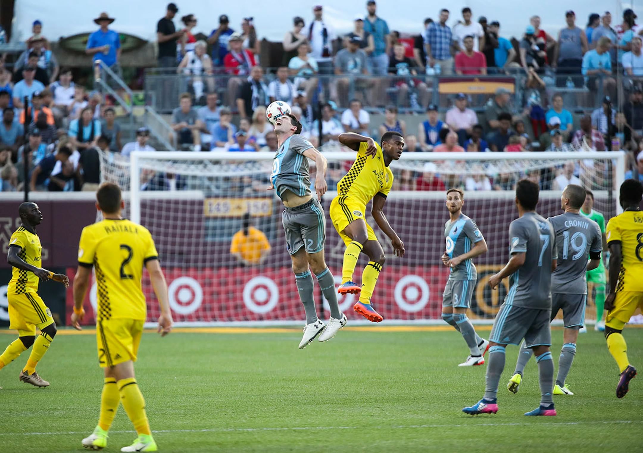 Minnesota United defender Joseph Greenspan (12) headed the ball away from Columbus Crew SC forward Ola Kamara (11) in the second half Tuesday at TCF Bank Stadium July 4, 2017 in Minneapolis, MN. ] Minnesota United hosted the Columbus at TCF Bank Stadium JERRY HOLT ï jerry.holt@startribune.com
