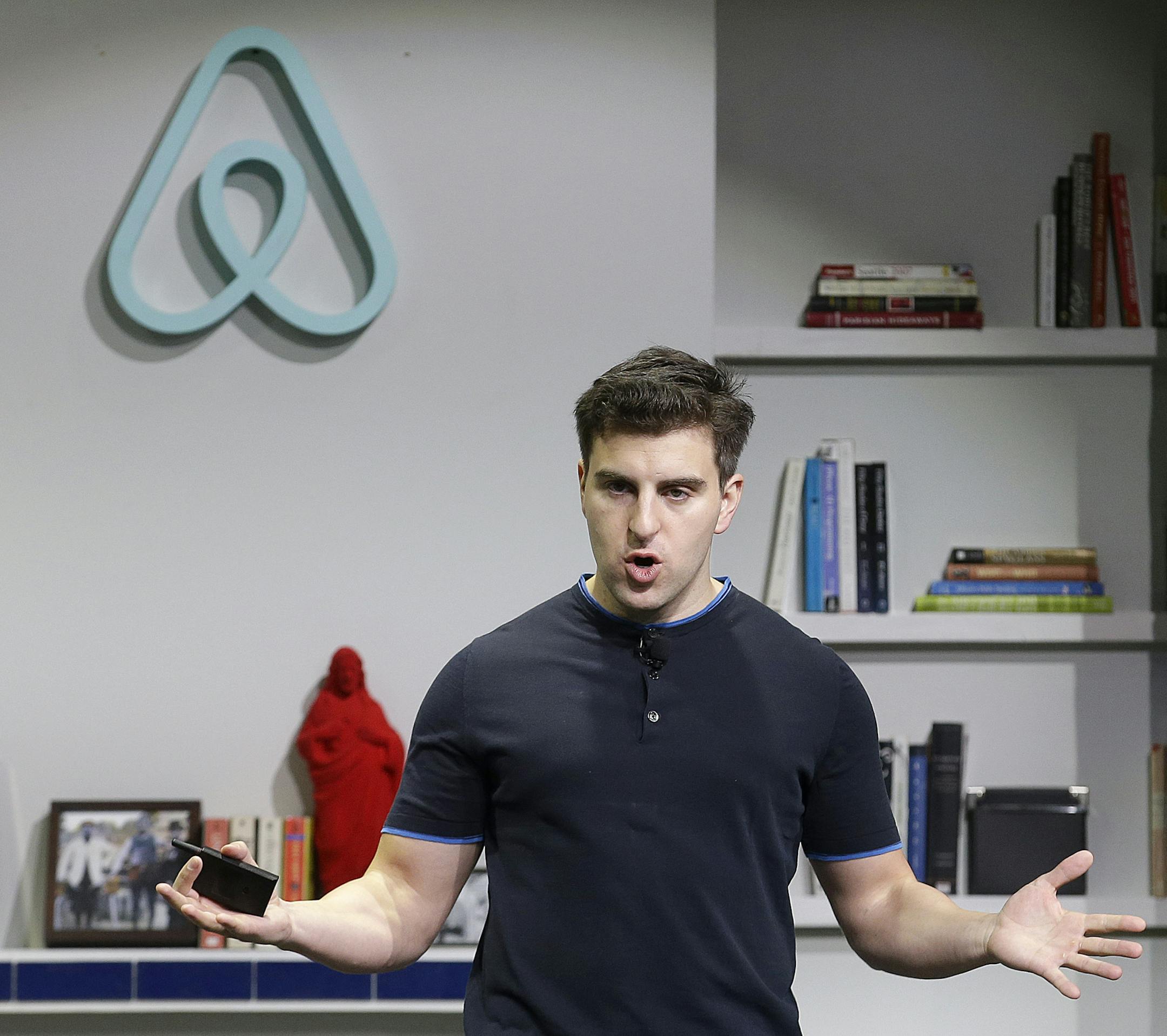 FILE - In this April 19, 2016 file photo, Airbnb co-founder and CEO Brian Chesky speaks during an announcement in San Francisco. Airbnb on Thursday, Sept. 8 apologized for its slow response to accusations of racism and outlined new policies to combat the problem, including reducing the prominence of photos in the booking process. "We have been slow to address these problems, and for this I am sorry," said Chesky in a message published on the vacation rental website's blog. (AP Photo/Jeff Chiu, F